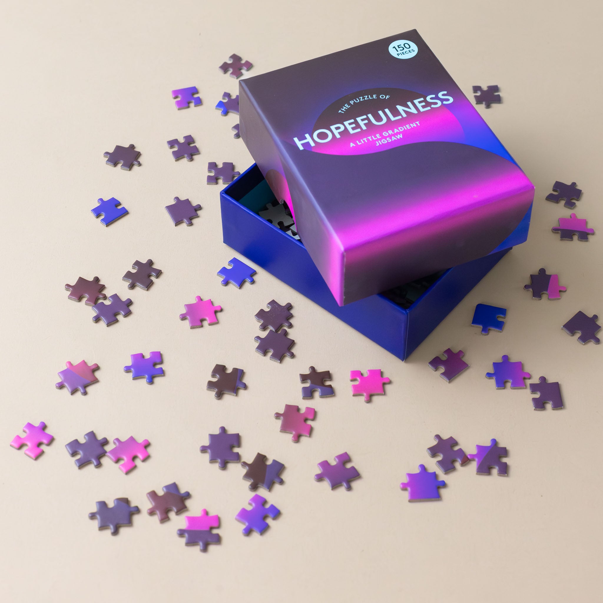 150-piece-gradient-puzzle-of-hopefulness-in-shades-of-purples-blues-and-pinks-example-pieces