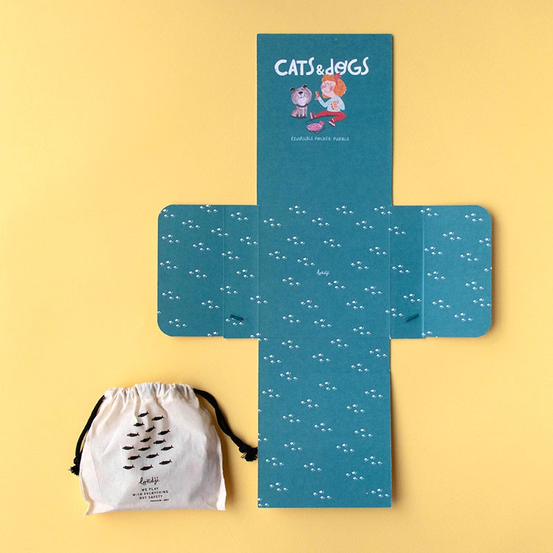 24-piece-double-sided-pocket-puzzle-cats-and-dogs Blue packaging and drawstring cotton bag with 'Cats & Dogs' branding on a yellow background