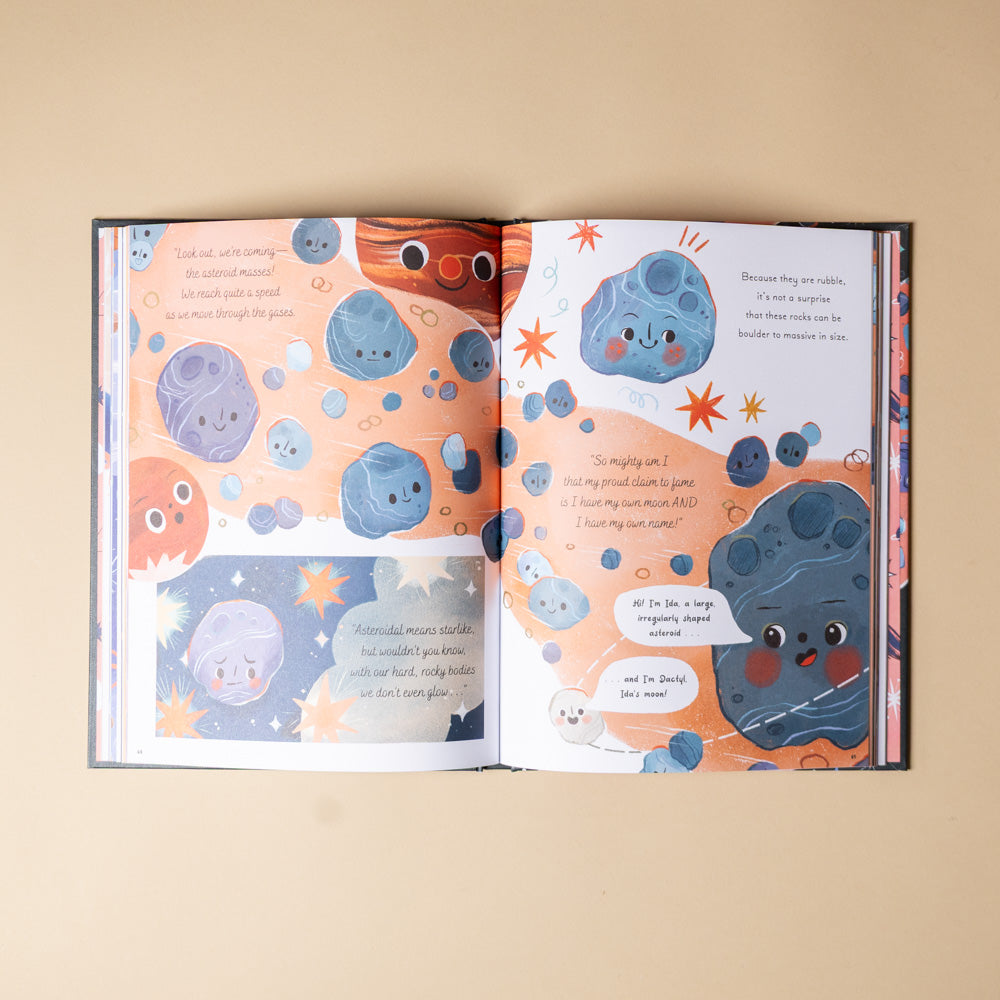 5-minute-space-stories-book Open book with colorful illustrations of celestial bodies on a beige background