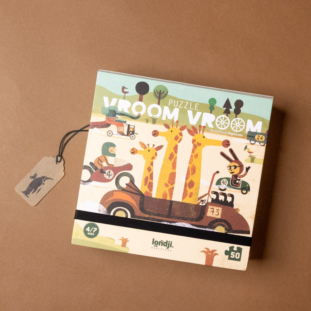 50-piece-pocket-puzzle-vroom-vroom titled 'Vroom Vroom' with a tag on a brown background