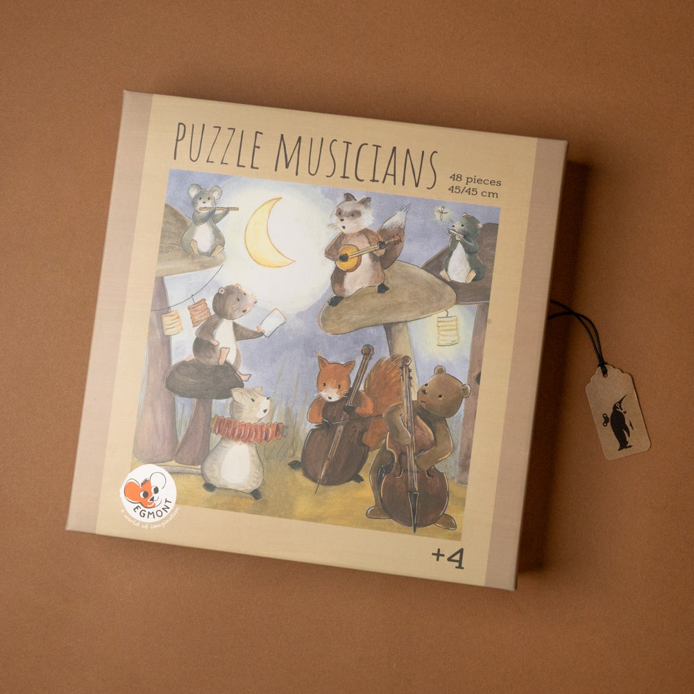 mushroom-musicians-48-piece-puzzle Puzzle box titled 'Puzzle Musicians' with illustrations of animals playing instruments on a brown background.
