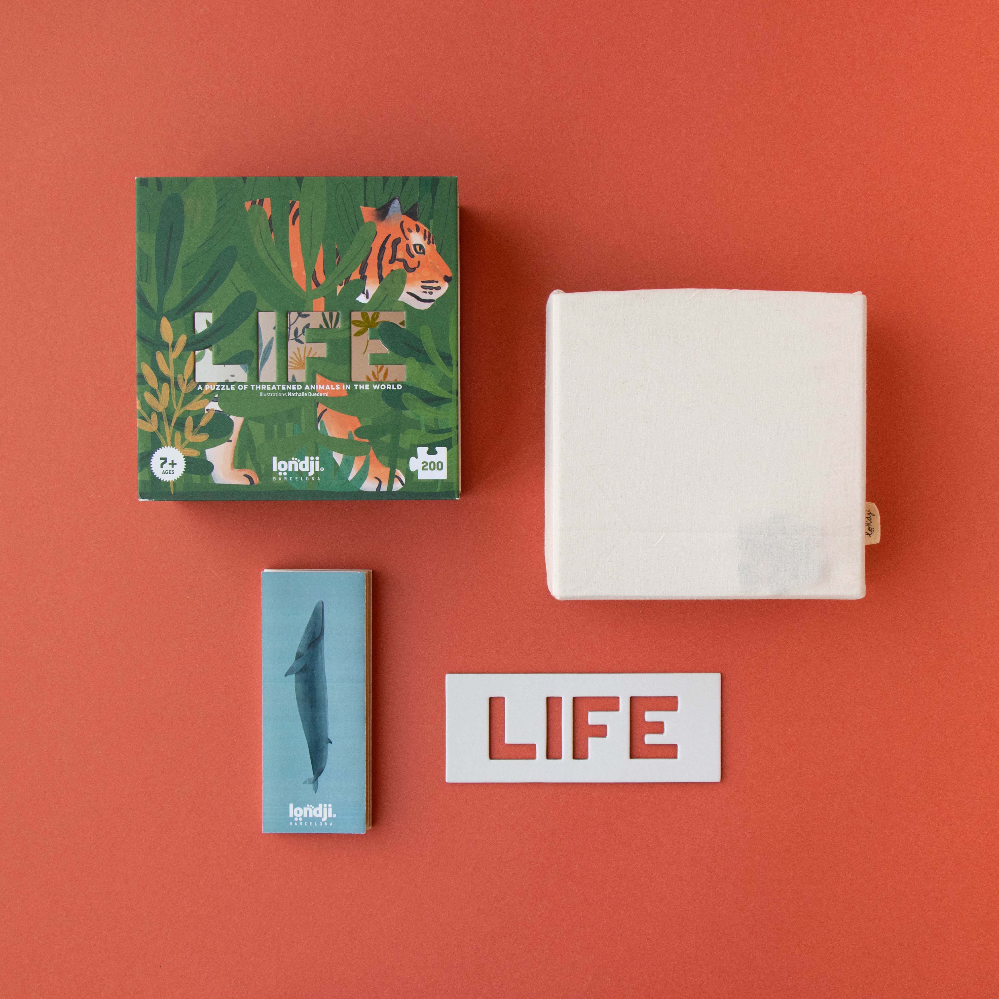 200-piece-life-puzzle of 'LIFE' branded products on a red background
