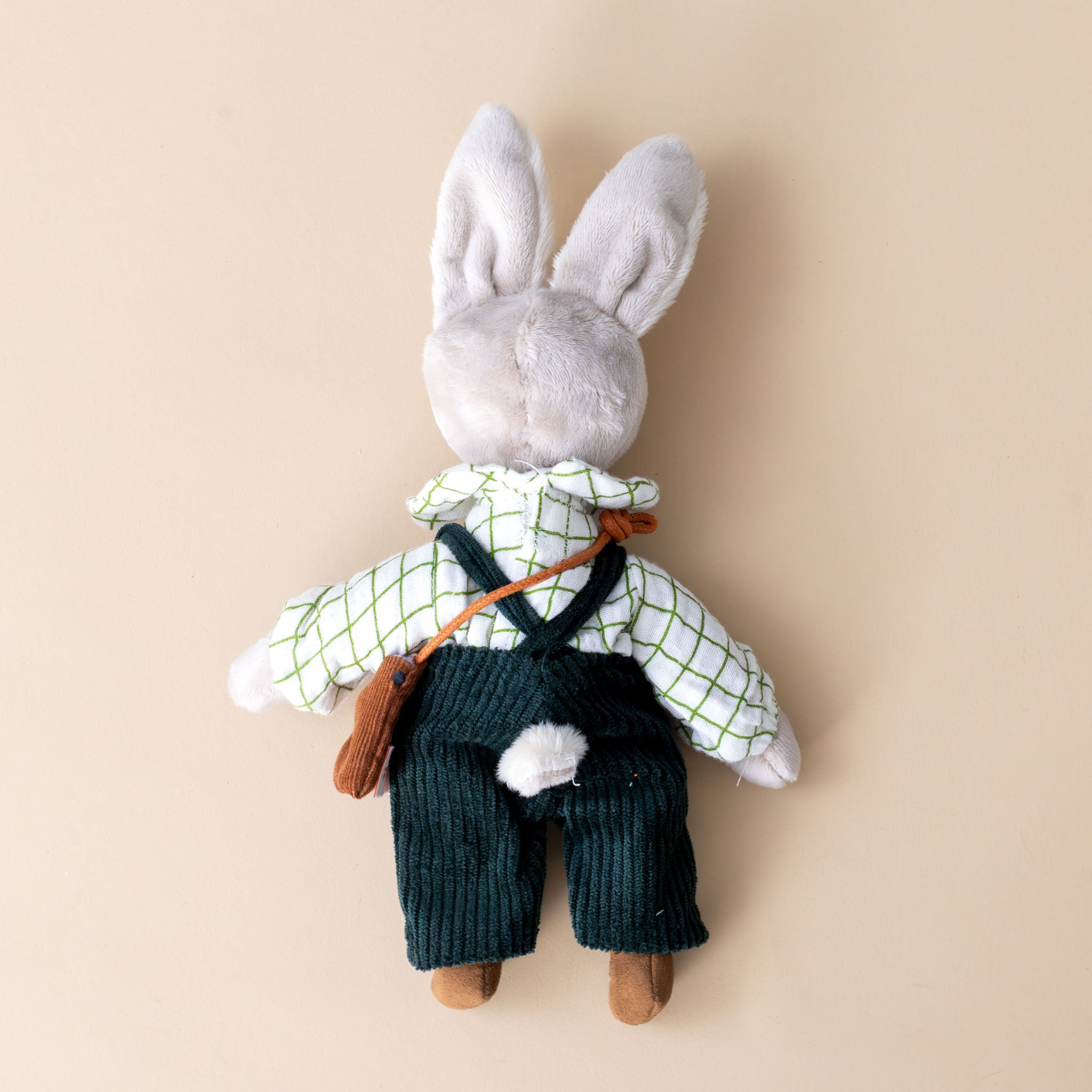 les-minouchkas-nine-the-rabbit-dressed-in-green-overalls-windowpane-checked-shirt-with-hearts-embroidered-on-collar-and-brown-satchel-back-with-tail