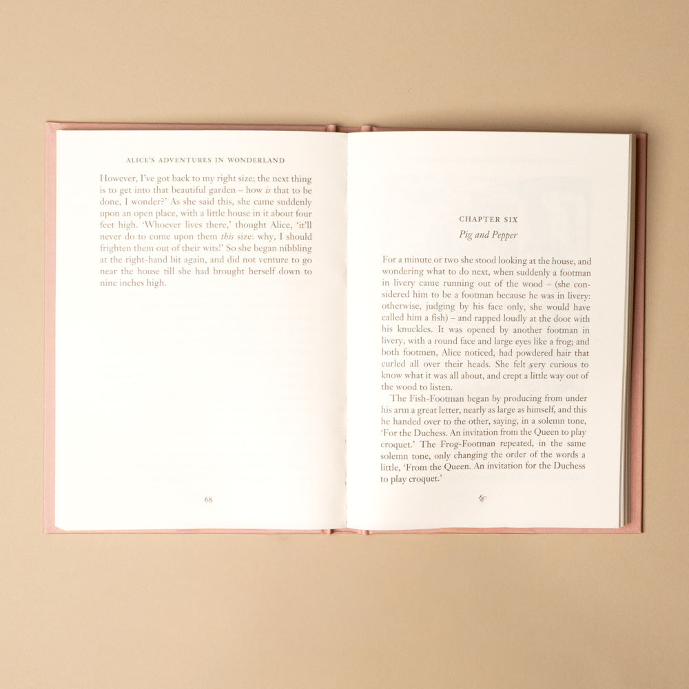 alice-in-wonderland Open book with text on a beige background