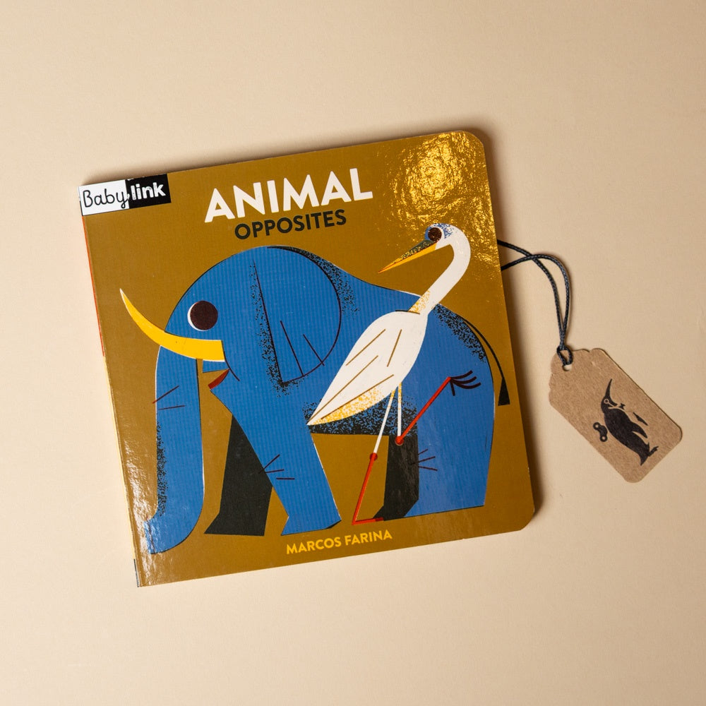 Children's book titled 'Animal Opposites' by Marcos Farina with an elephant and egret illustration on a beige background.