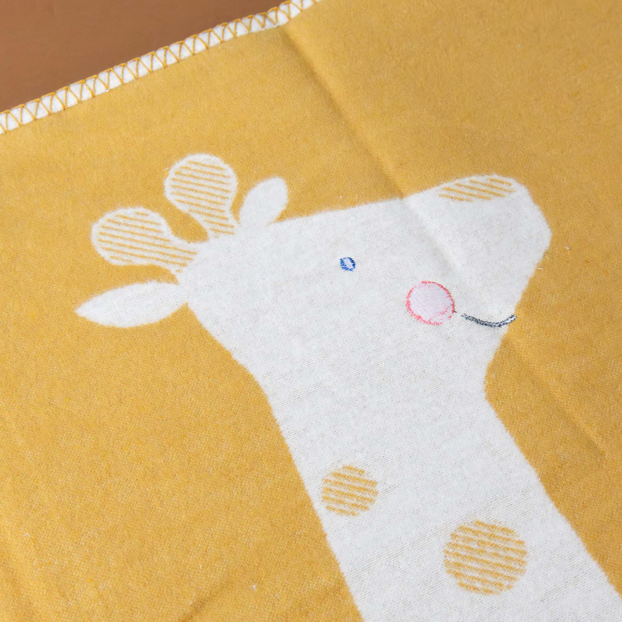 baby-blanket-embroidered-giraffe-embroidered-cheeks-eyes-and-smile