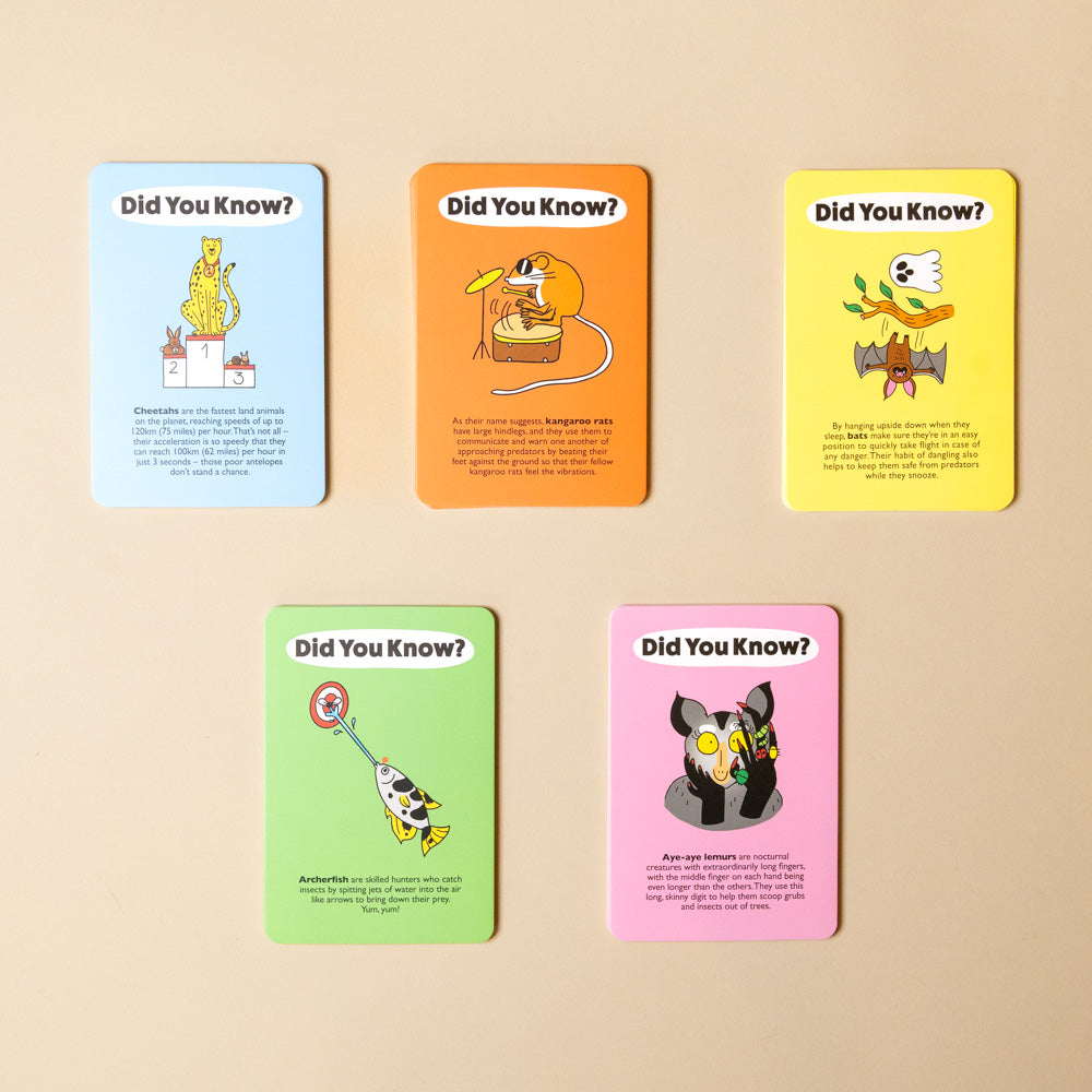 beat-the-cheetah-50-animal-inspired-challenges Five educational cards with colorful backgrounds and cartoon illustrations on a beige background.