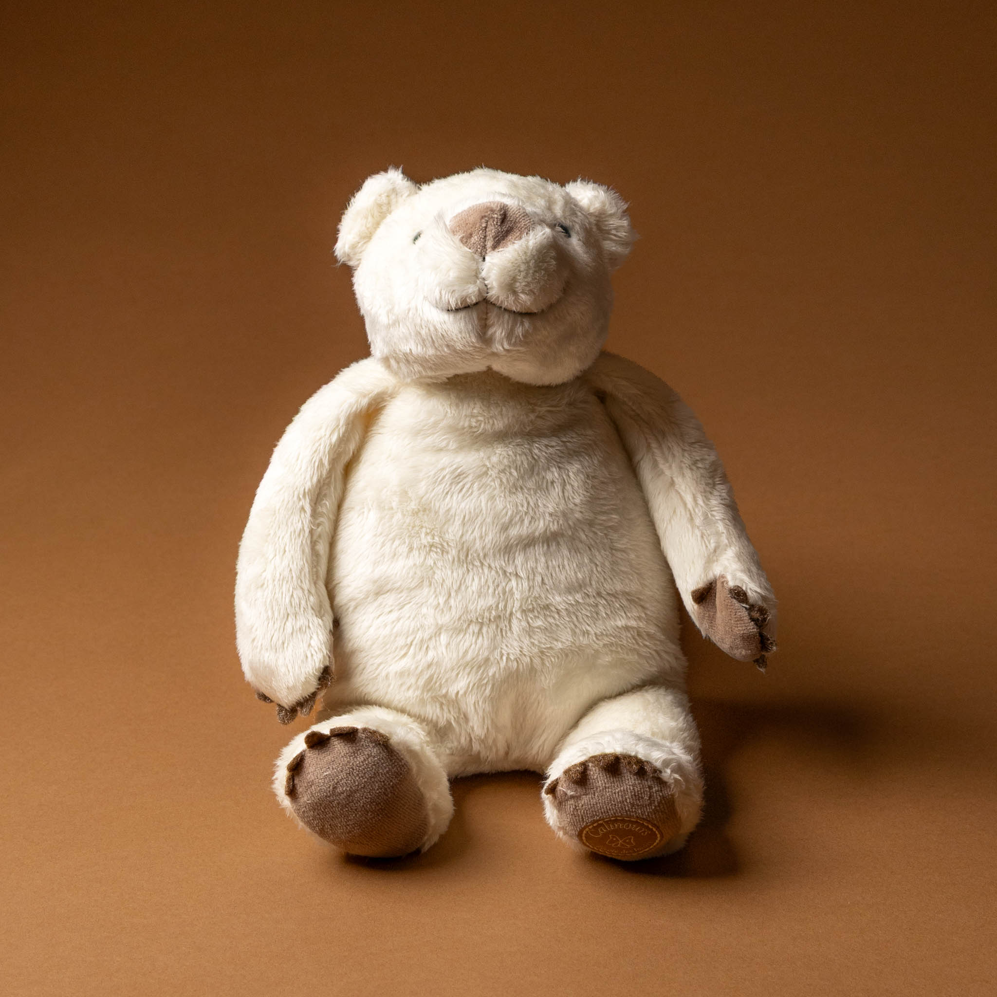 calinours-white-polar-bear-stuffed-animal-sitting