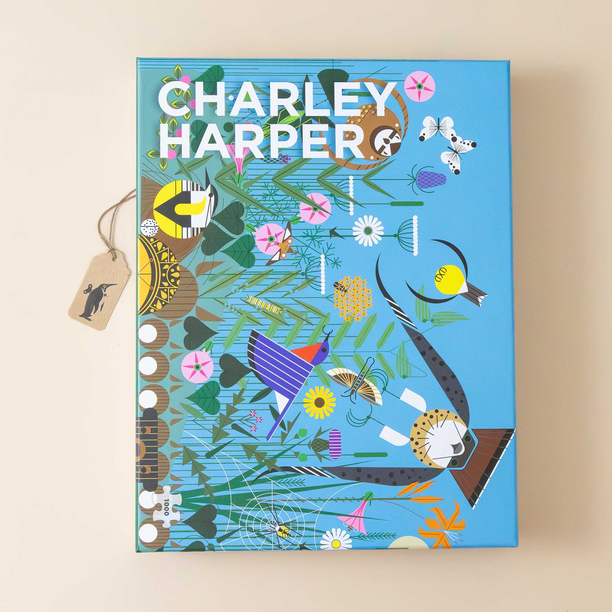 charley-harpers-1000-piece-wild-summer-puzzle-blue-box-wiht-animals-and-flowers