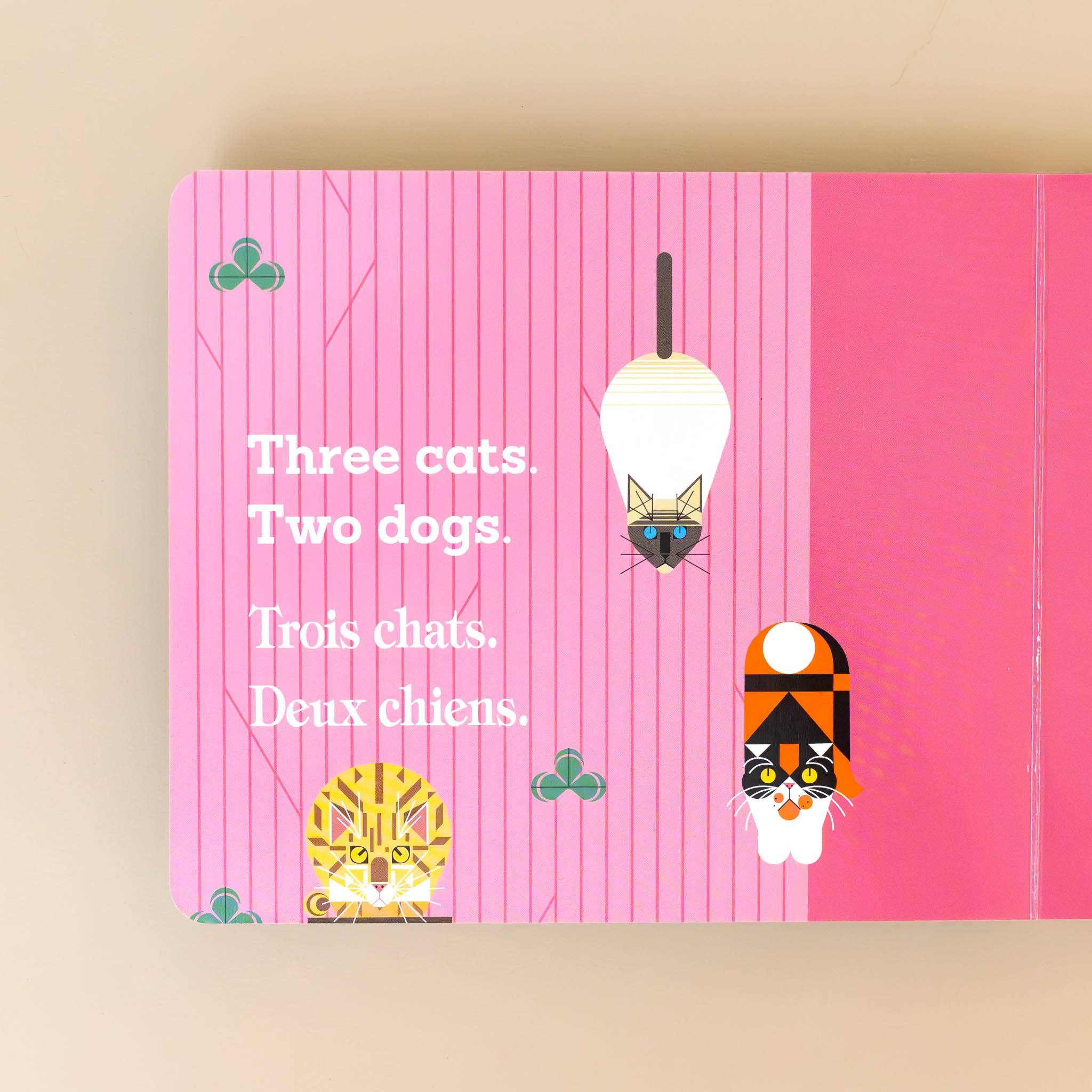 Analyzing image charley-harpers-cats-and-dogs-multilingual-counting-book-three-cats-two-dogs-repeated-in-french-with-illustrations