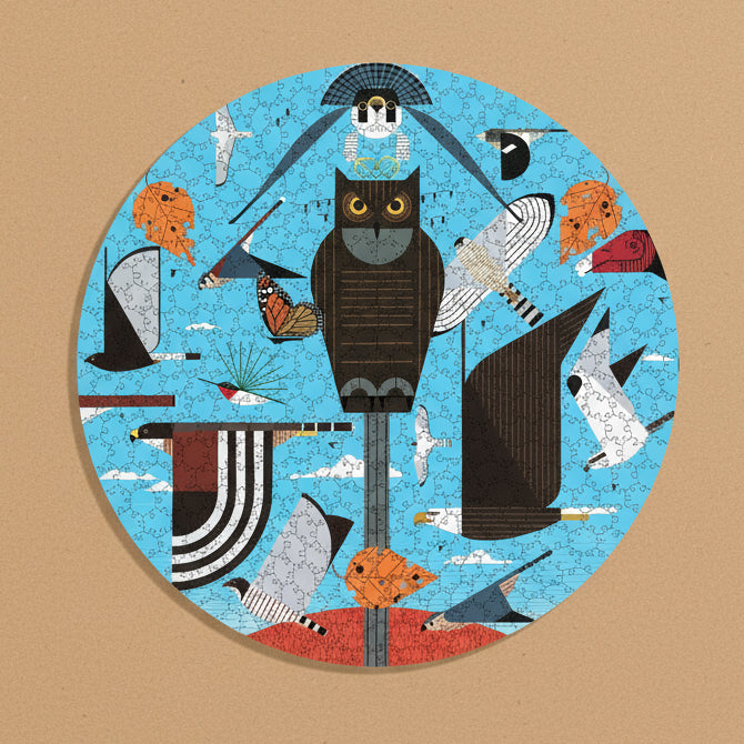 Circular puzzle with various animals on a blue background