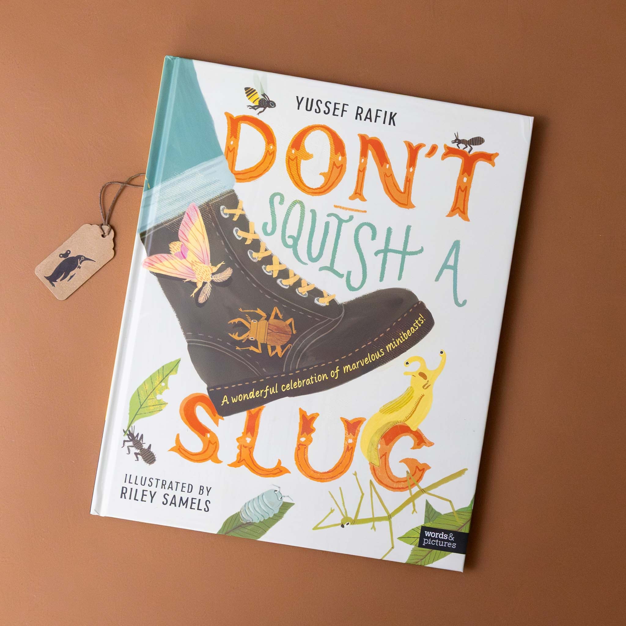dont-squish-a-slug-book-cover-with-slugs-and-bugs-clinging-to-a-boot