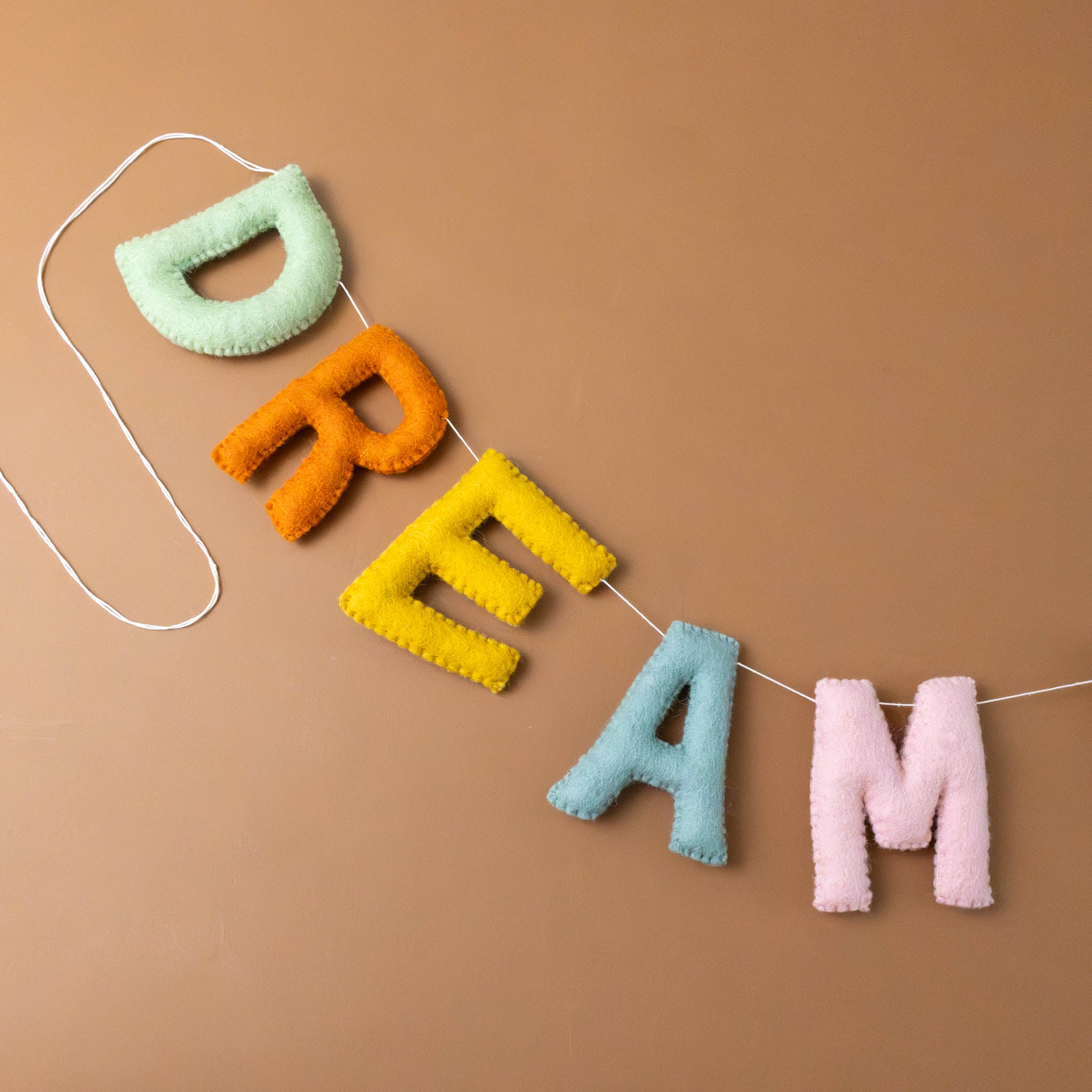 felted-dream-garland-rainbow-colored