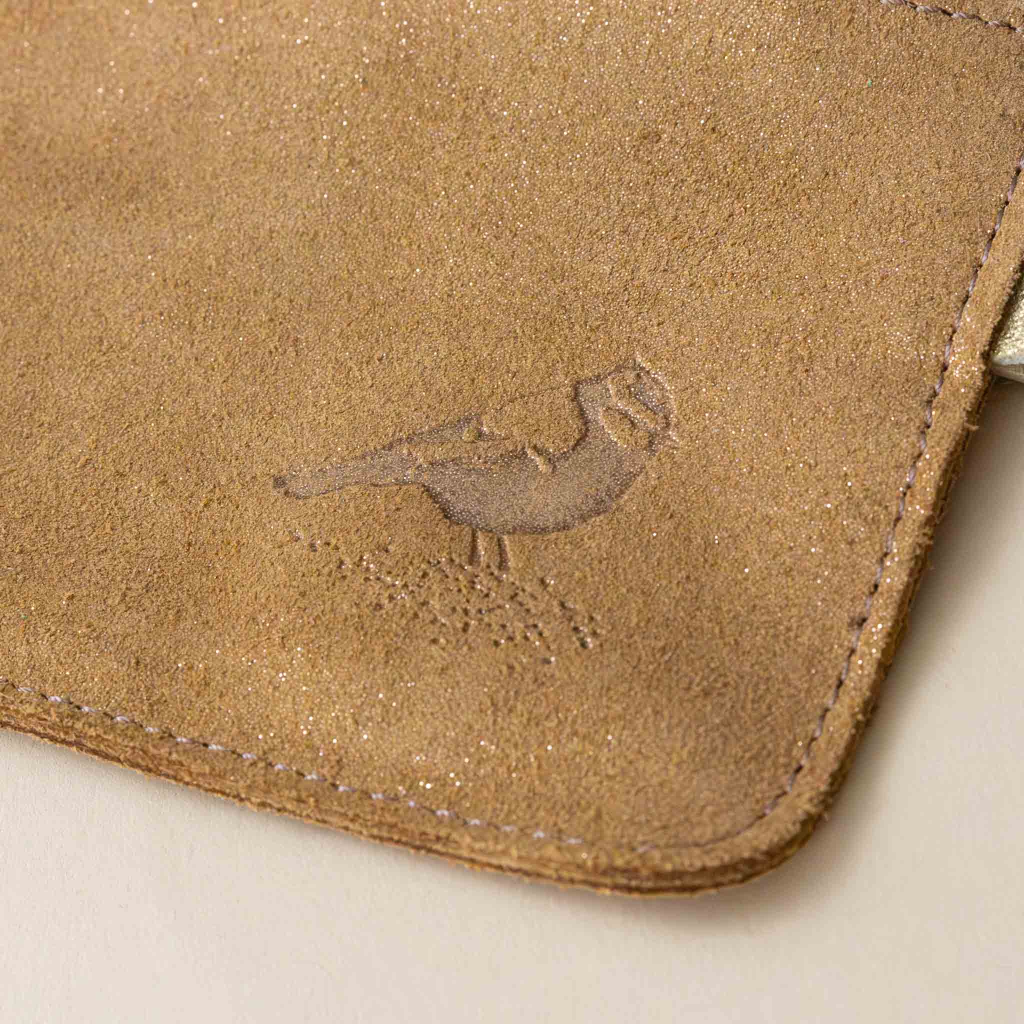 glitter-coin-purse-marron-glace-soft-golden-brown-with-birdie-emblem