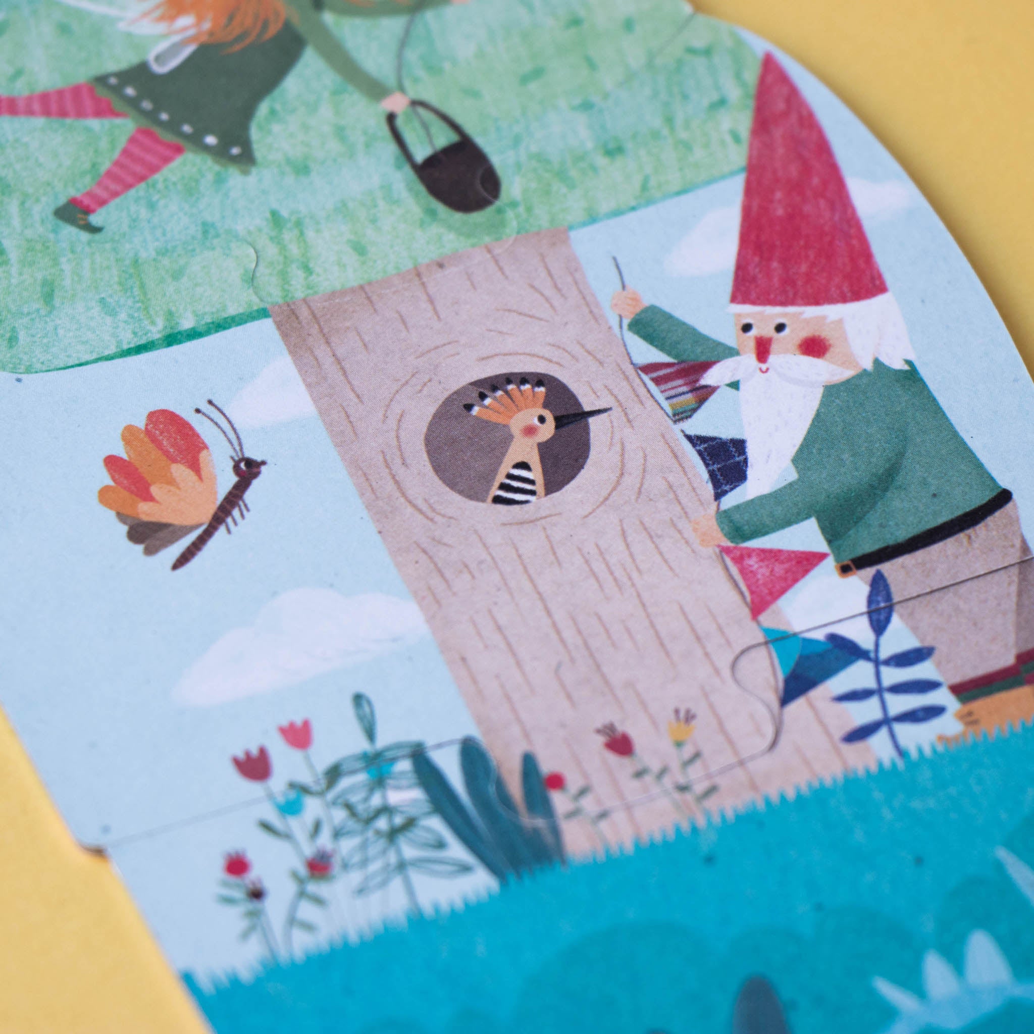 happy-birthday-unicorn-progressive-puzzle-box-featuring-a-unicorn-with-a-rainbow-mane-gnome-hanging-garland-on-a-tree