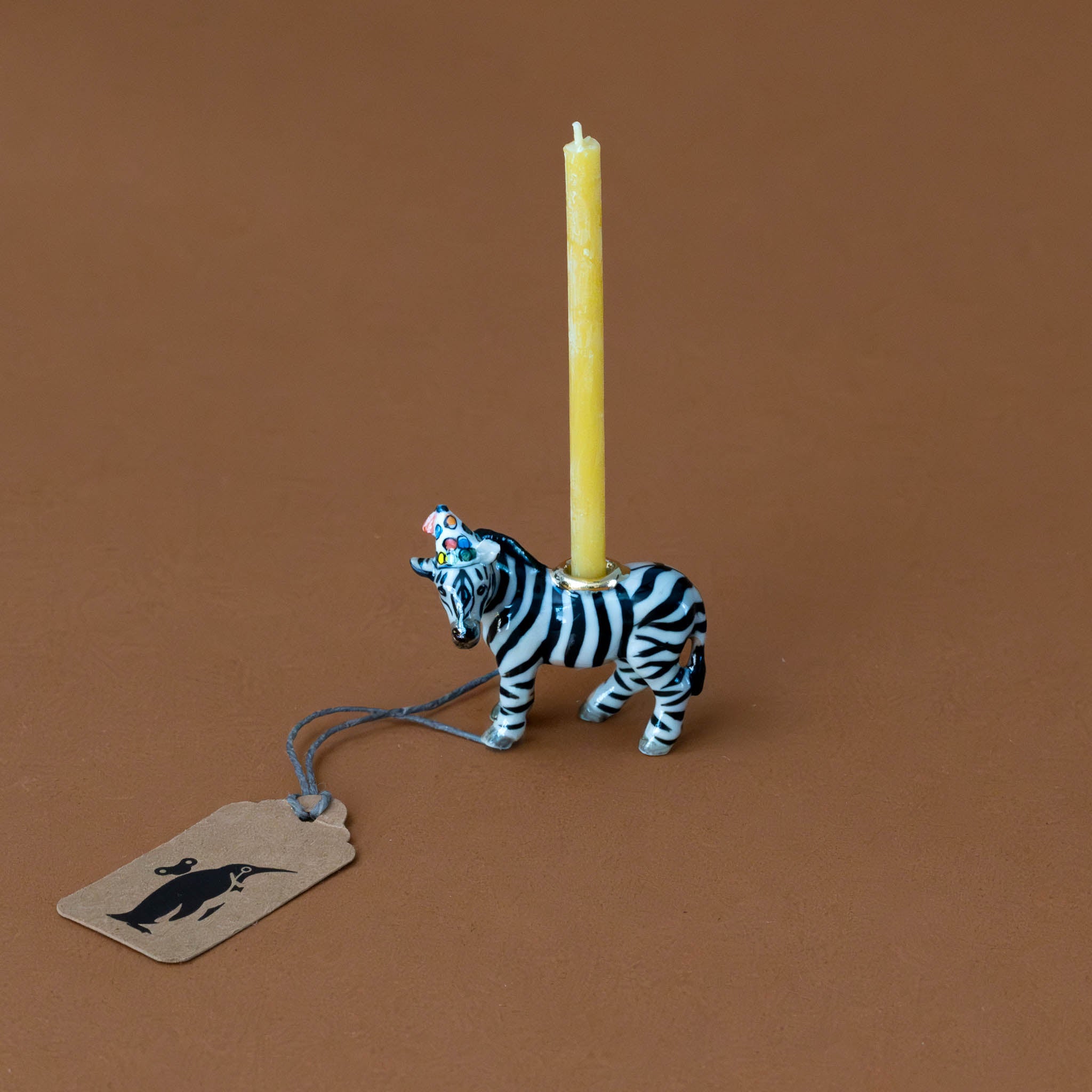 heirloom-porcelain-cake-topper-zebra-with-candle