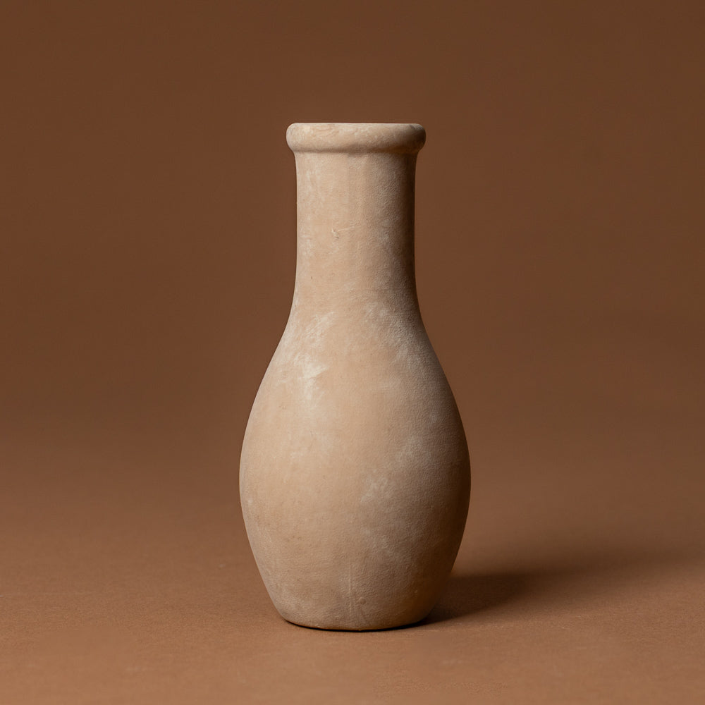 holden-bud-vase-medium Beige ceramic vase on a brown background