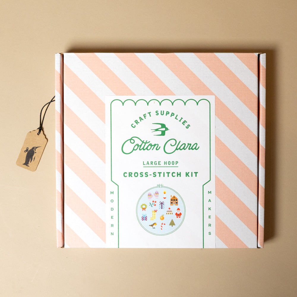 holiday-cross-stitch-kit--beginner packaging with striped design on a beige background