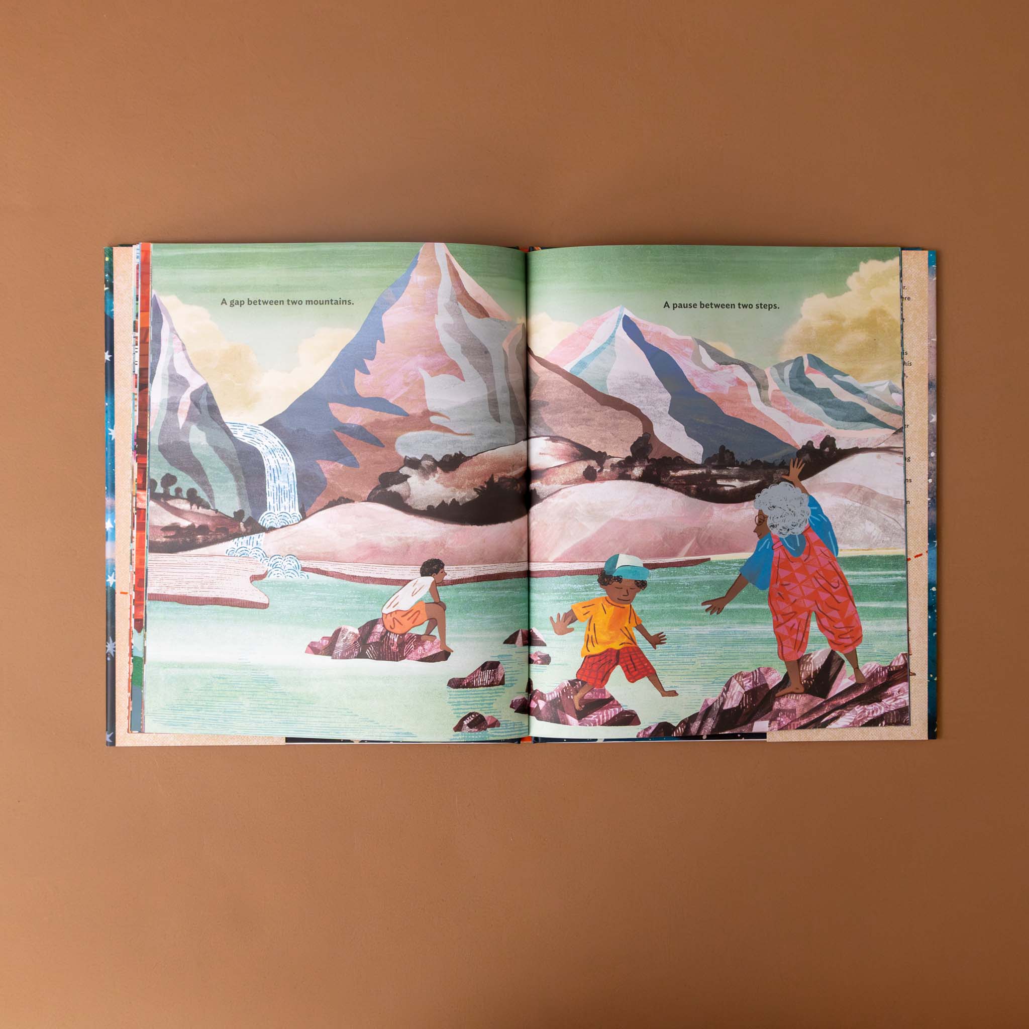 in-between-places-book-illustration-of-children-surrounded-by-mountains.walking-on-rock-path-through-water-to-parent-and-text-a-gap-between-two-mountains-a-pause-between-two-steps