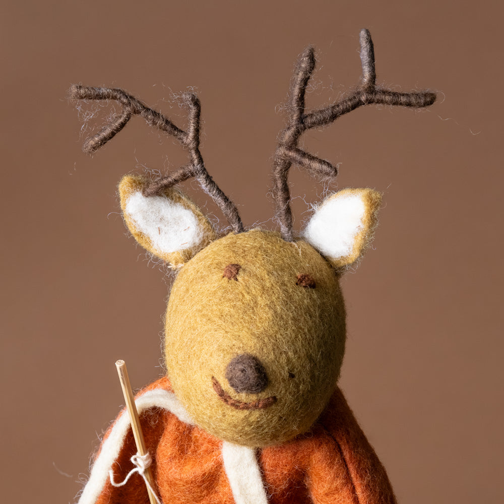 jumbo-felted-brown-deer-rust-sweater-and-fishing-pole-face