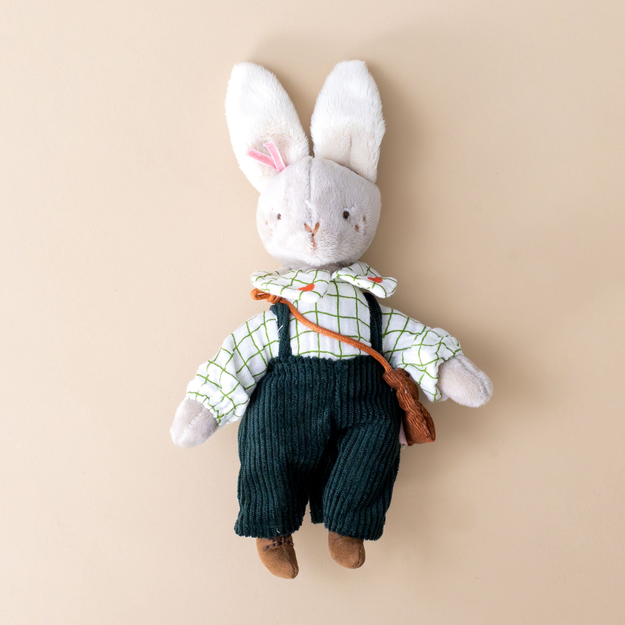 les-minouchkas-nine-the-rabbit-dressed-in-green-overalls-windowpane-checked-shirt-with-hearts-embroidered-on-collar-and-brown-satchel