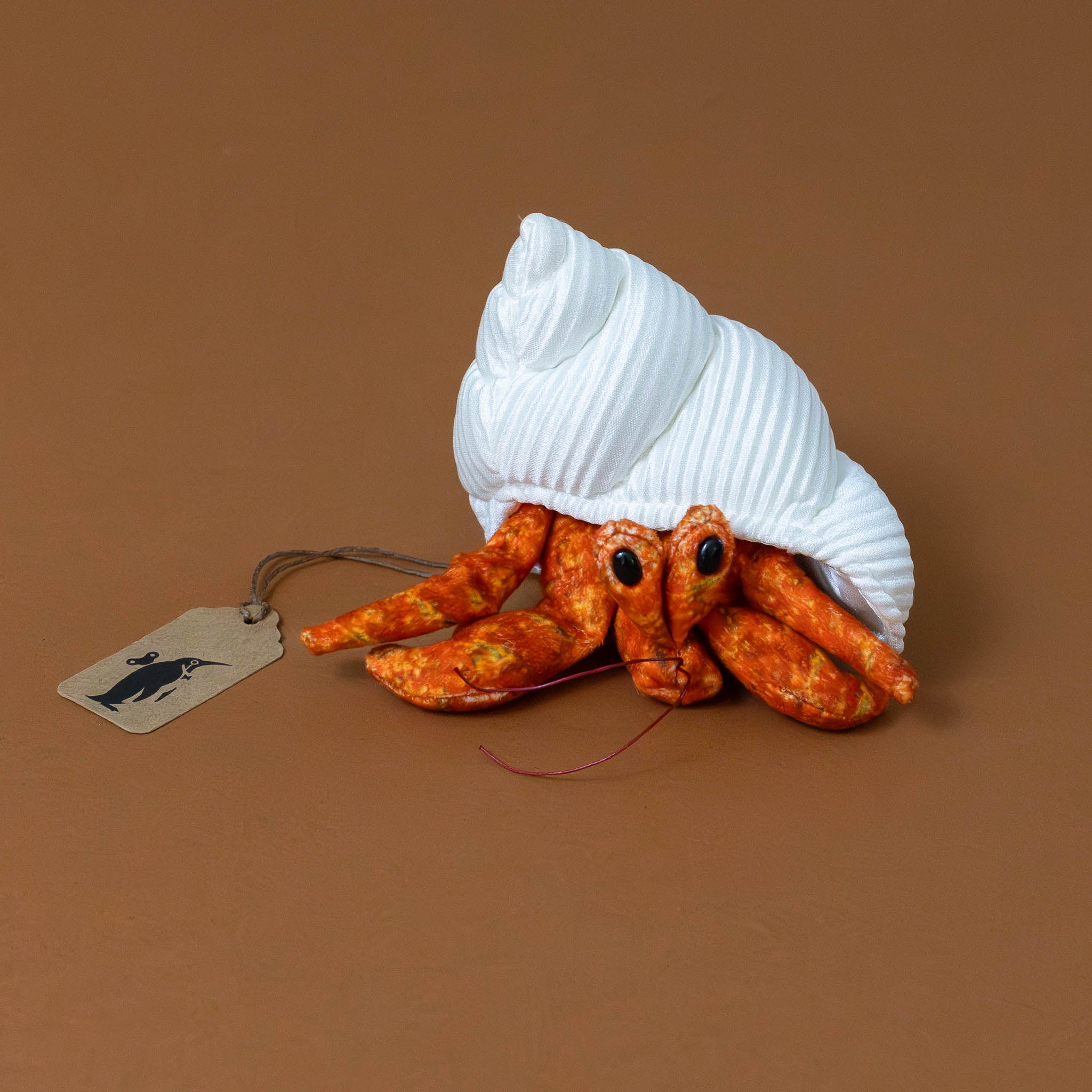 little-orange-hermit-crab-finger-puppet-with-white-corded-shell