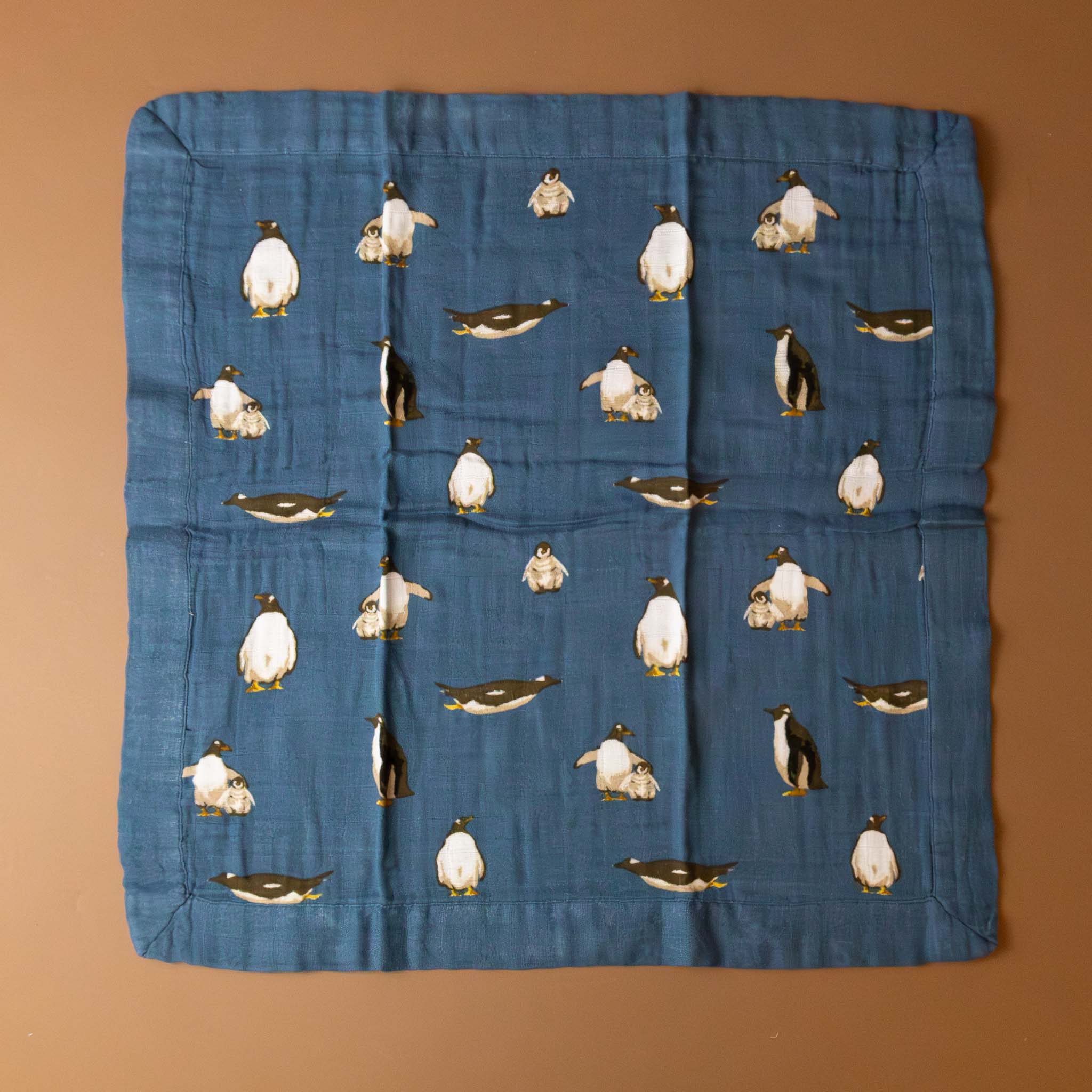 little-lovie-penguins-blue-background