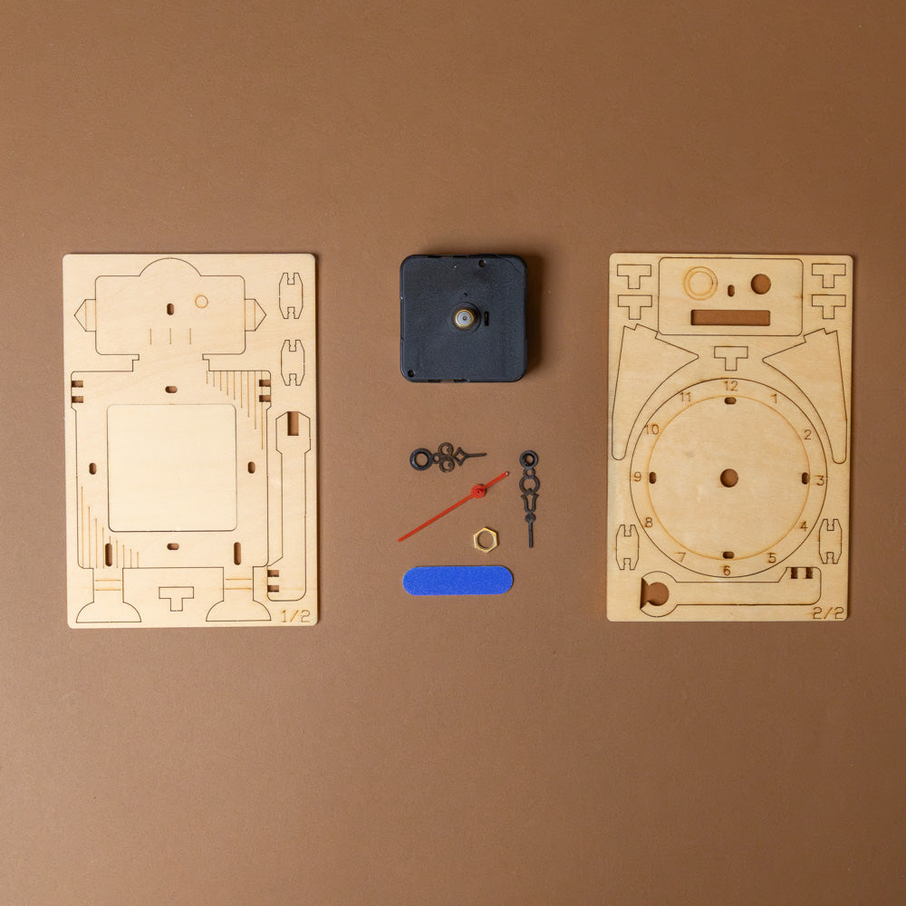 make-your-own-robot-clock-kit Wooden clock components on a brown background