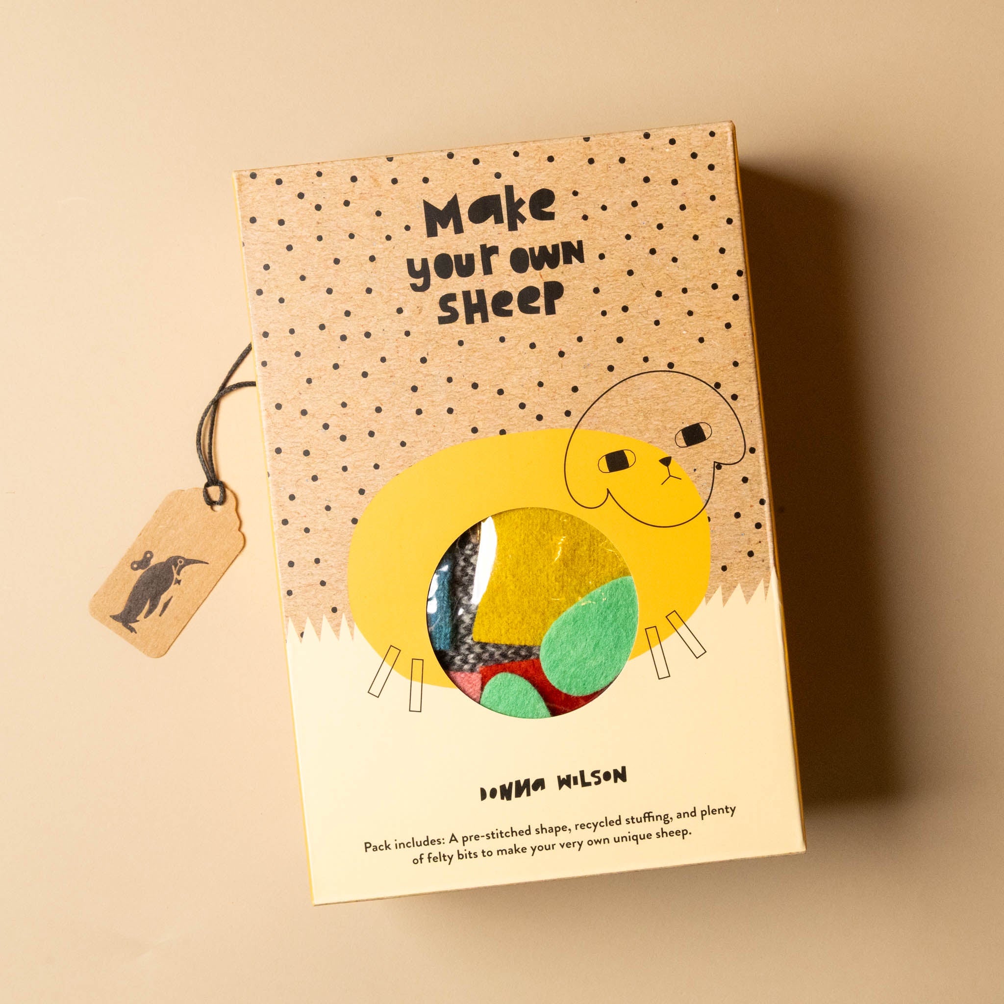 make-your-own-sheep-kit-box-with-illustration-of-sheep-with-materials-seen-through-clear-portion