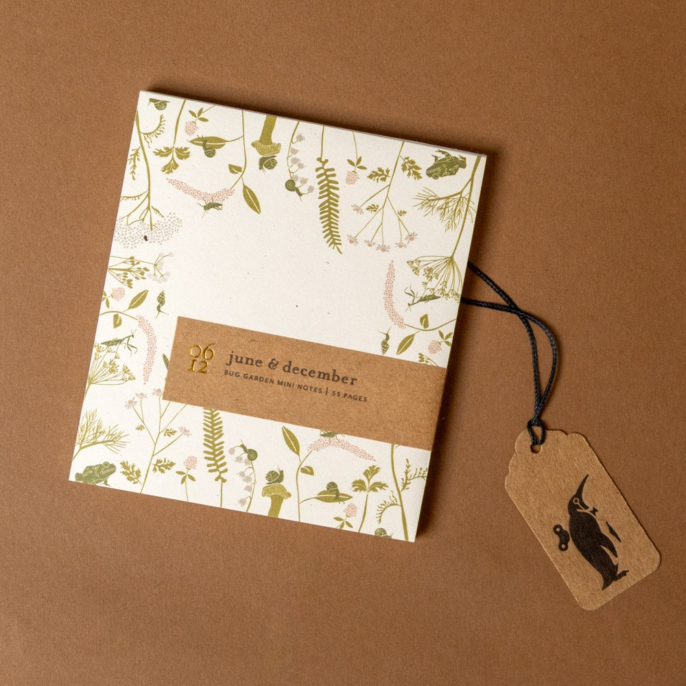 mini-notes-bug-garden with botanical design on a brown background