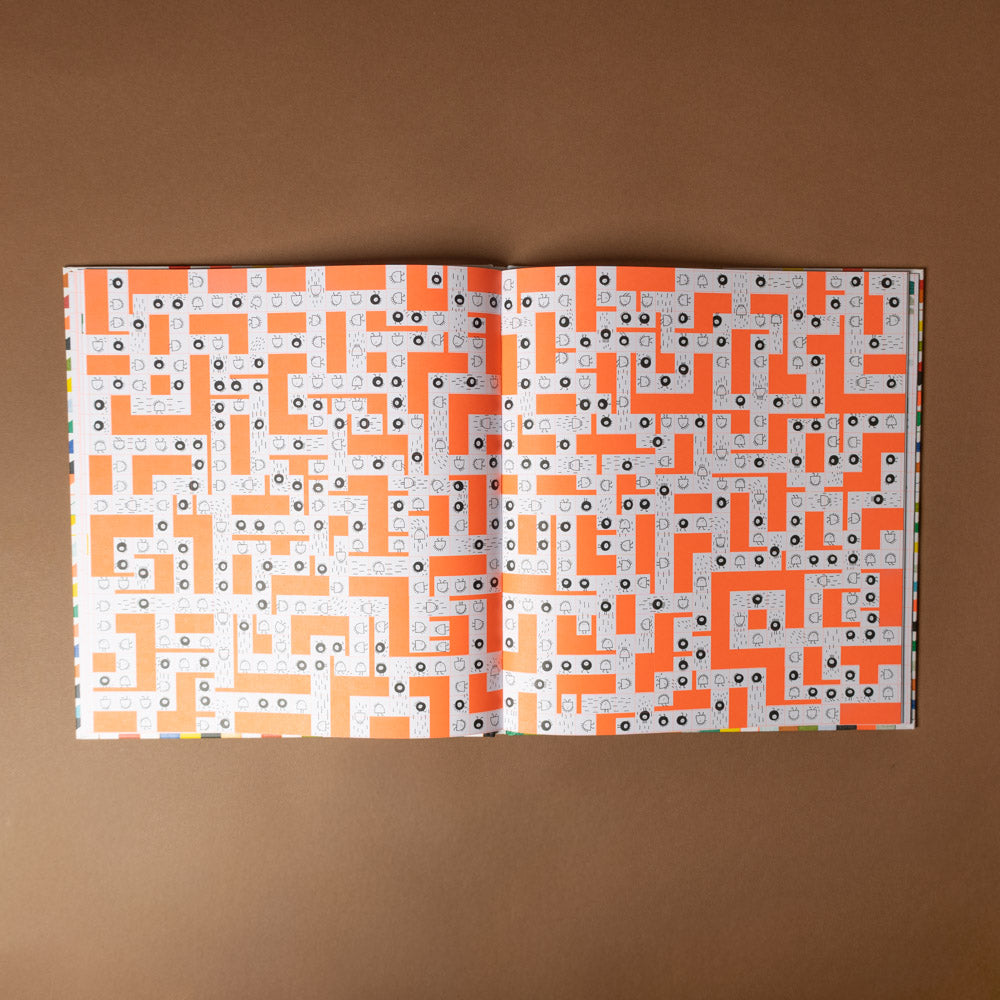 mr-search-and-mrs-find Open book with geometric pattern on a brown background