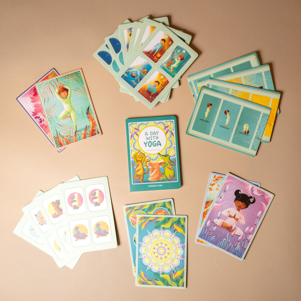 my-little-interactive-box-of-yoga Collection of colorful yoga-themed cards on a beige background