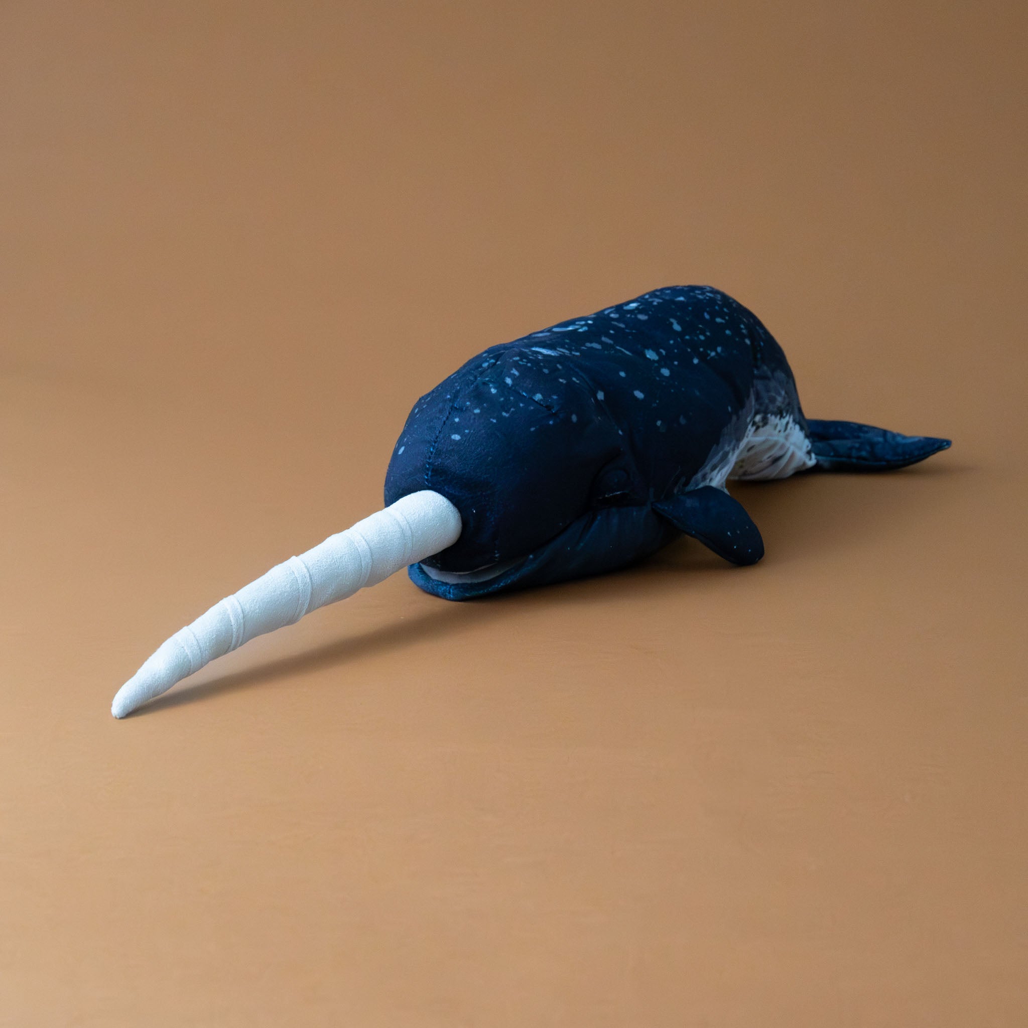 blue-spotted-narwhal-with-white-horn-hand-puppet-side