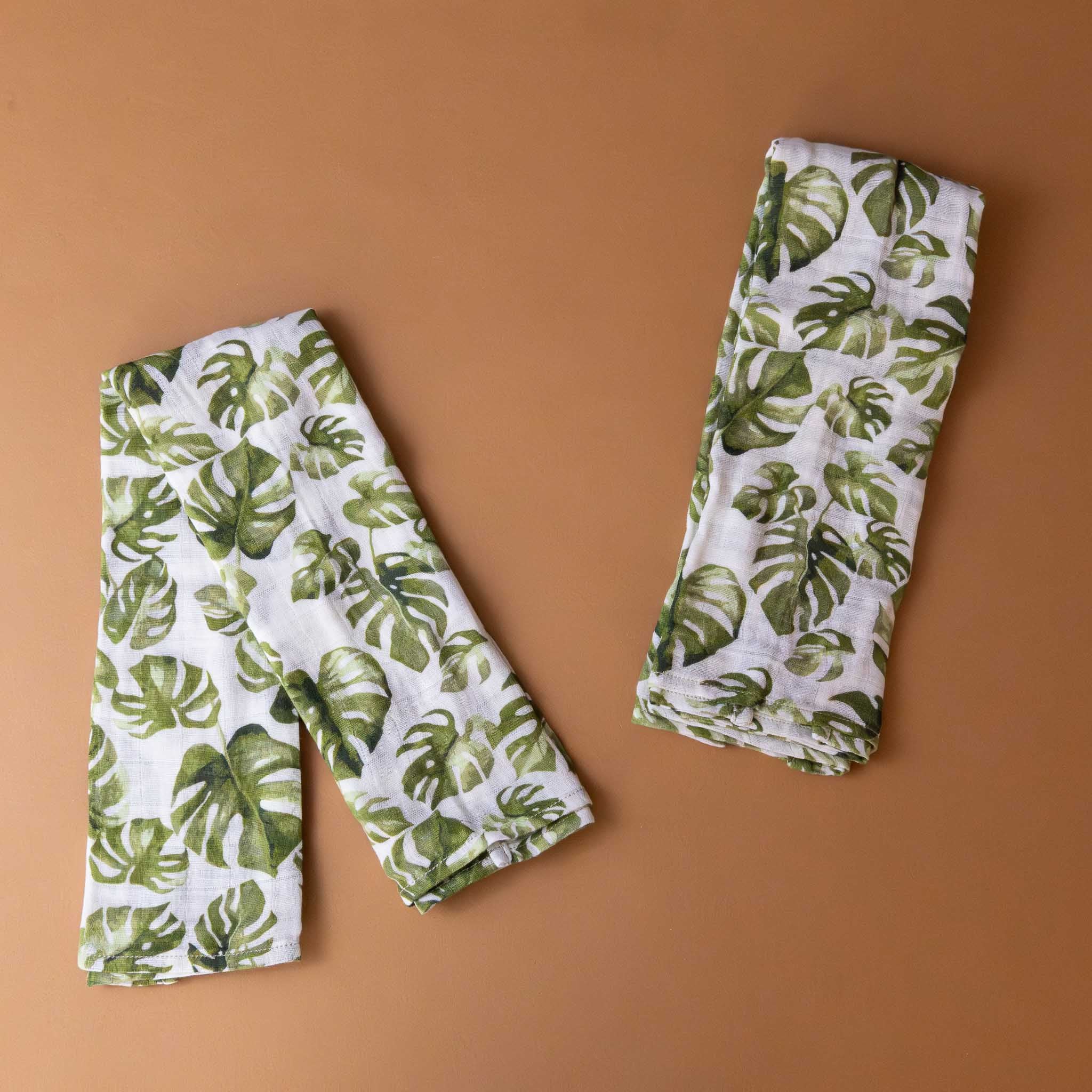 2-organic-cotton-burpie-set-monstera-leaf-green-on-white-print