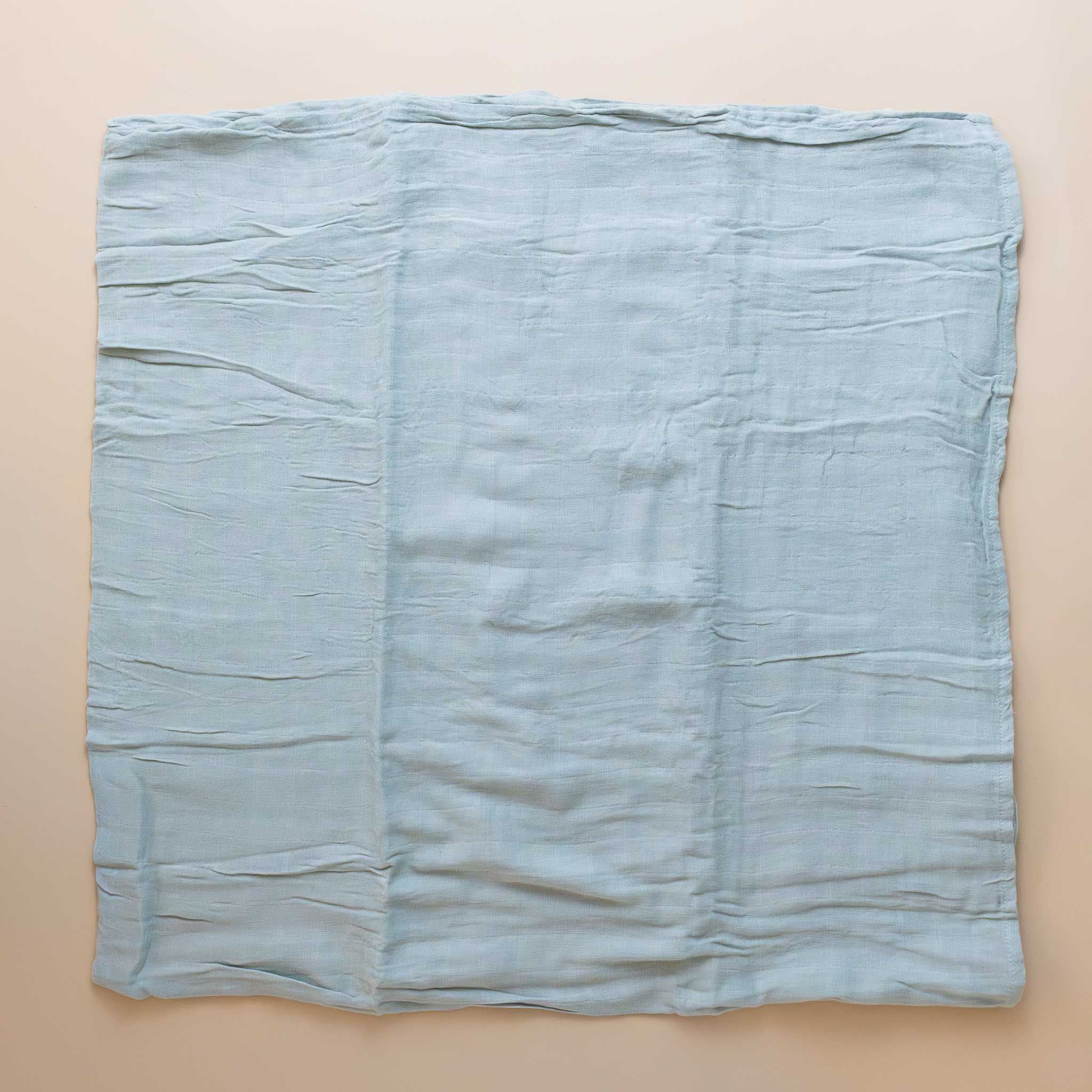 organic-cotton-muslin-swaddle-white-sage-open