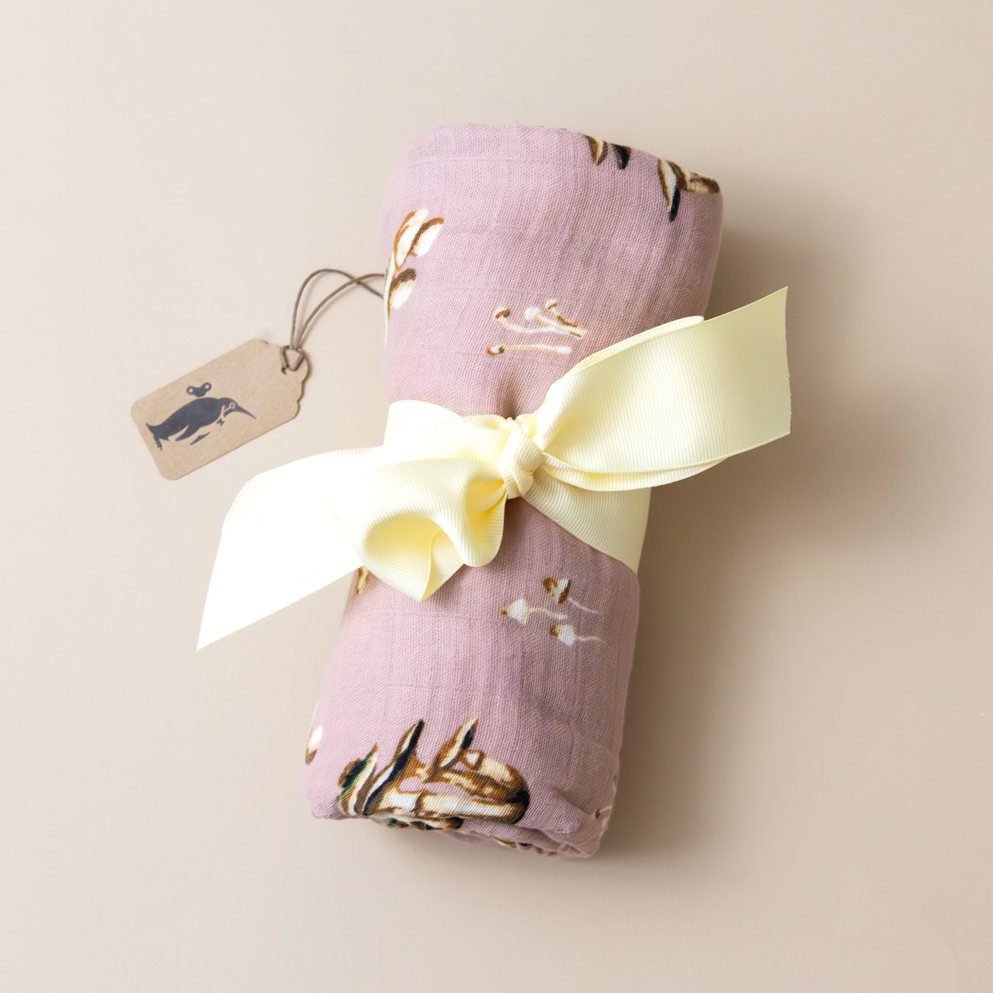 organic-cotton-swaddle-mushroom-pink-tied-in-a-bow