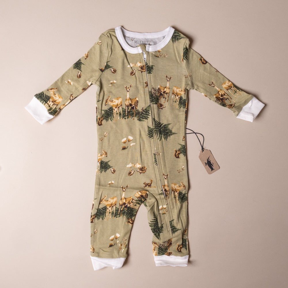 organic-cotton-zipper-pajamas-forest-party with forest animal pattern on a beige background