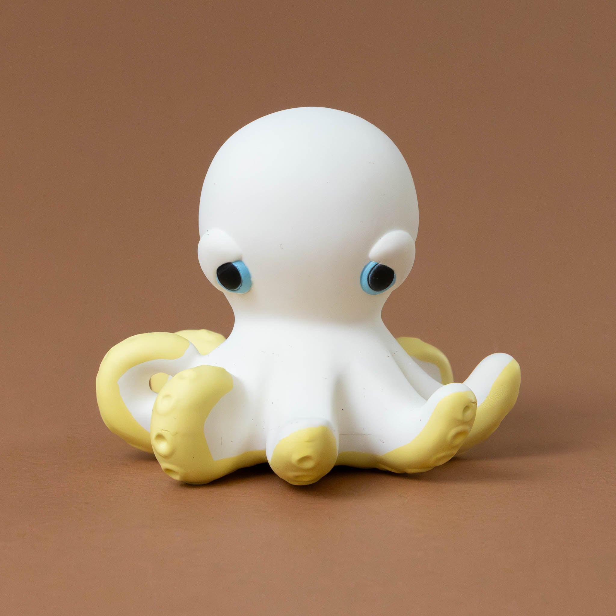 orlando-the-octopus-white-with-yellow-tentacles-and-blue-eyes