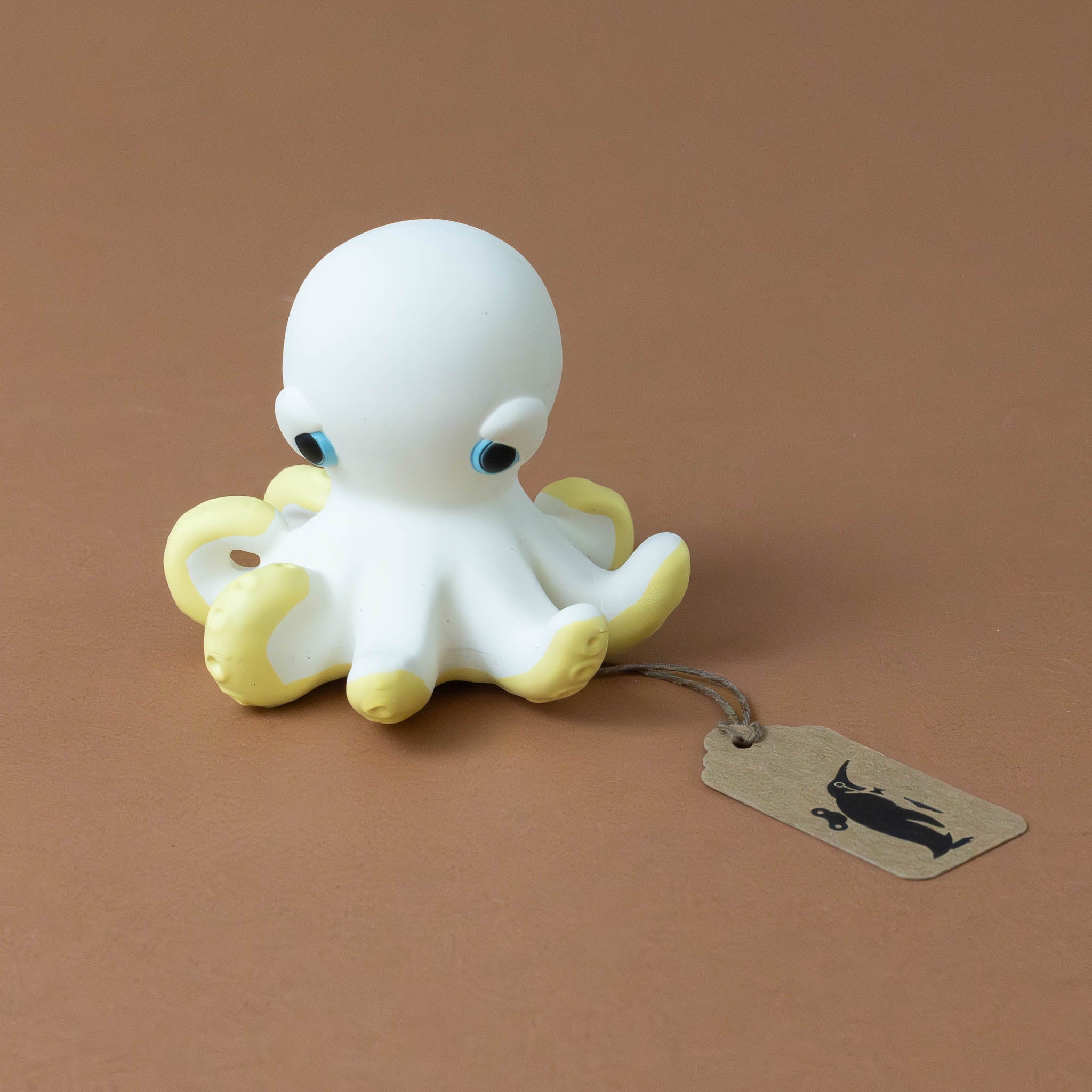 orlando-the-octopus-white-with-yellow-tentacles-and-blue-eyes