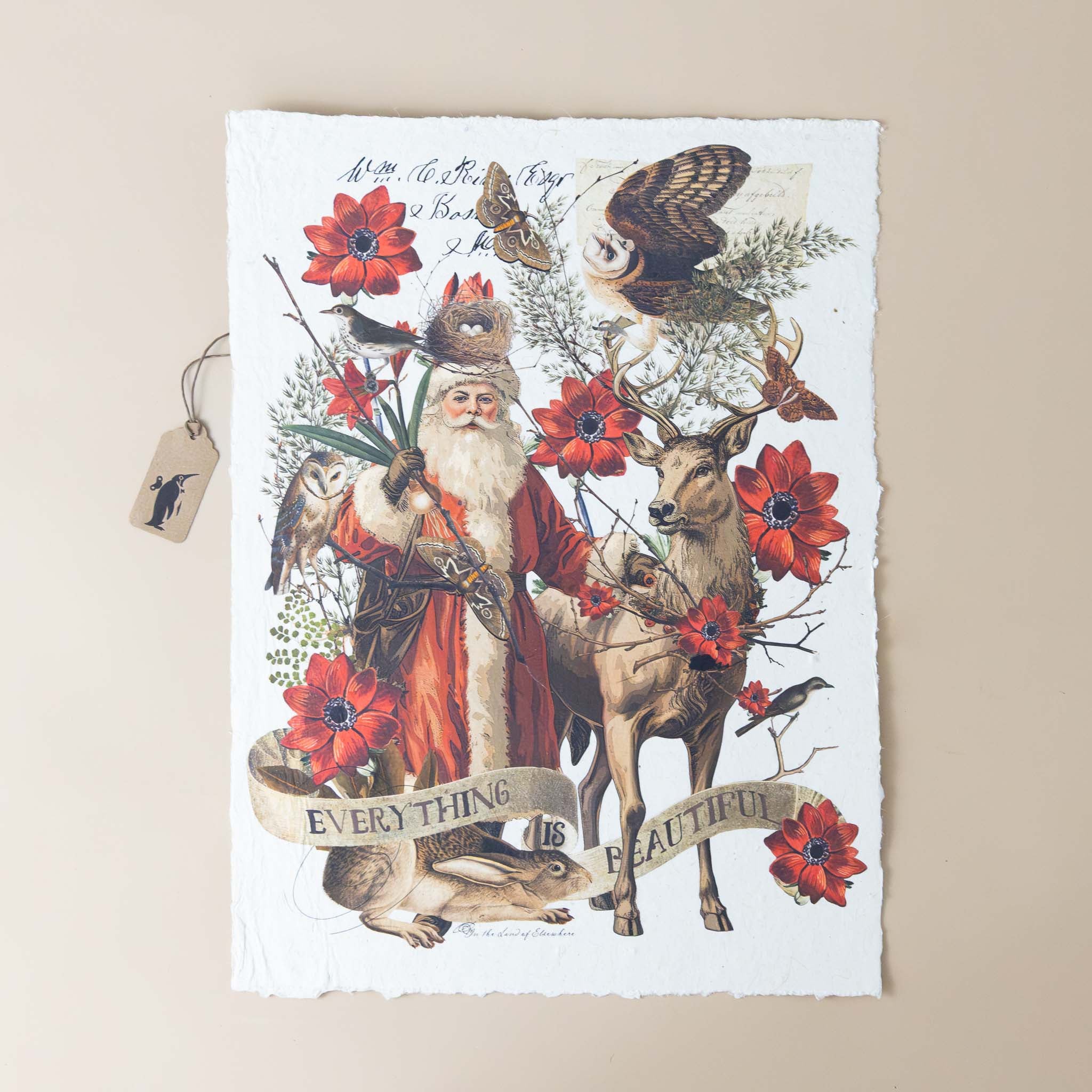 paper-print-everything-is-beautiful-image-of-santa-bird-and-deer-along-with-red-flowers-with-script-text-and-scroll