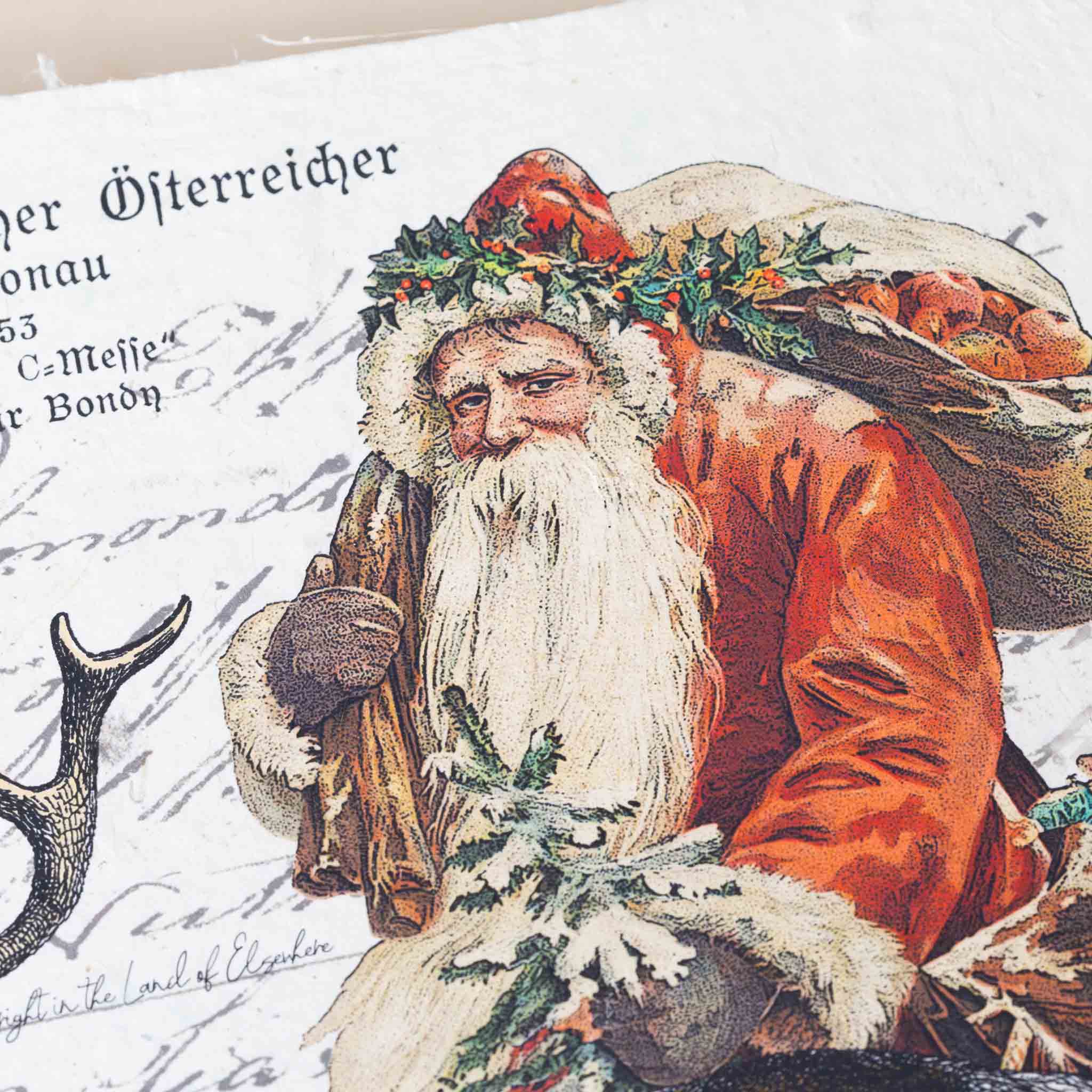 paper-print-home-for-christmas-image-of-santa-with-presents-and-deer-with-script