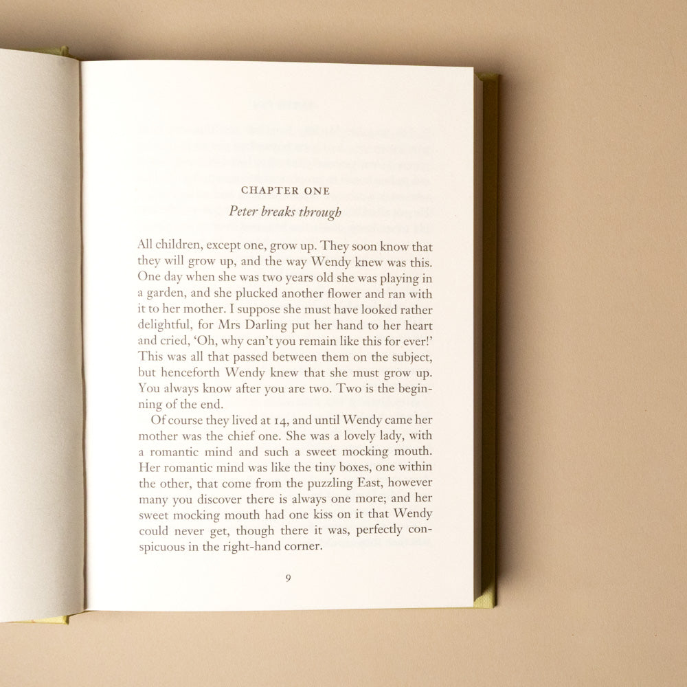 peter-pan Open book with text on a beige background