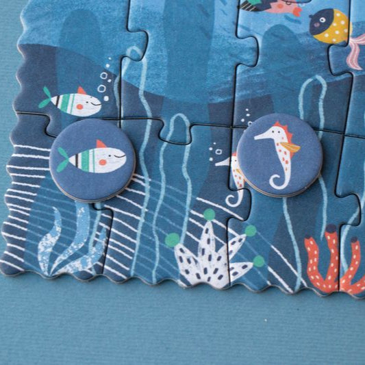 petite-36-piece-observation-puzzle-ocean Children's puzzle with ocean-themed design on a blue background