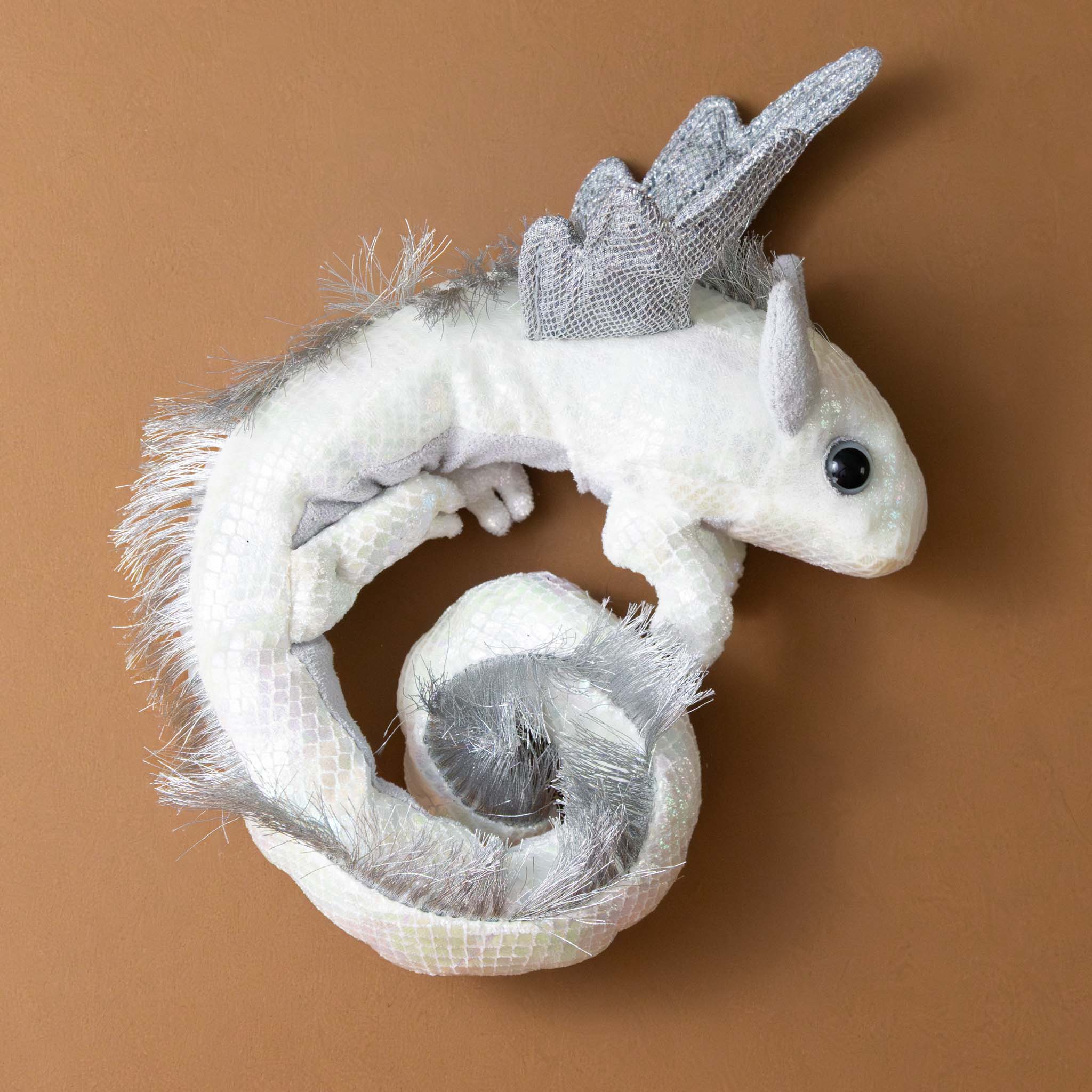 petite-dragon-wristlet-pearl-wiht-gray-wings-and-horns-side