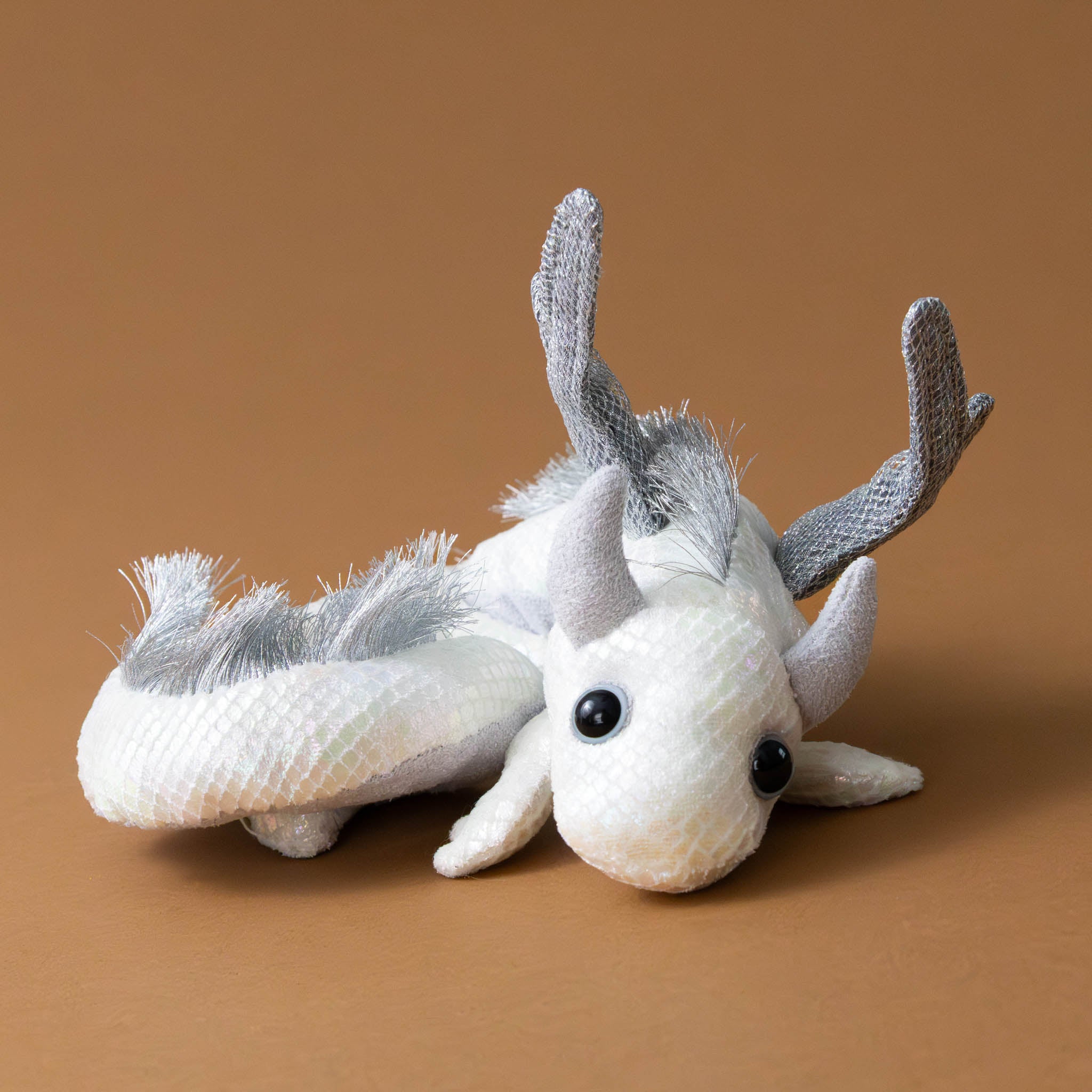 petite-dragon-wristlet-pearl-wiht-gray-wings-and-horns-front