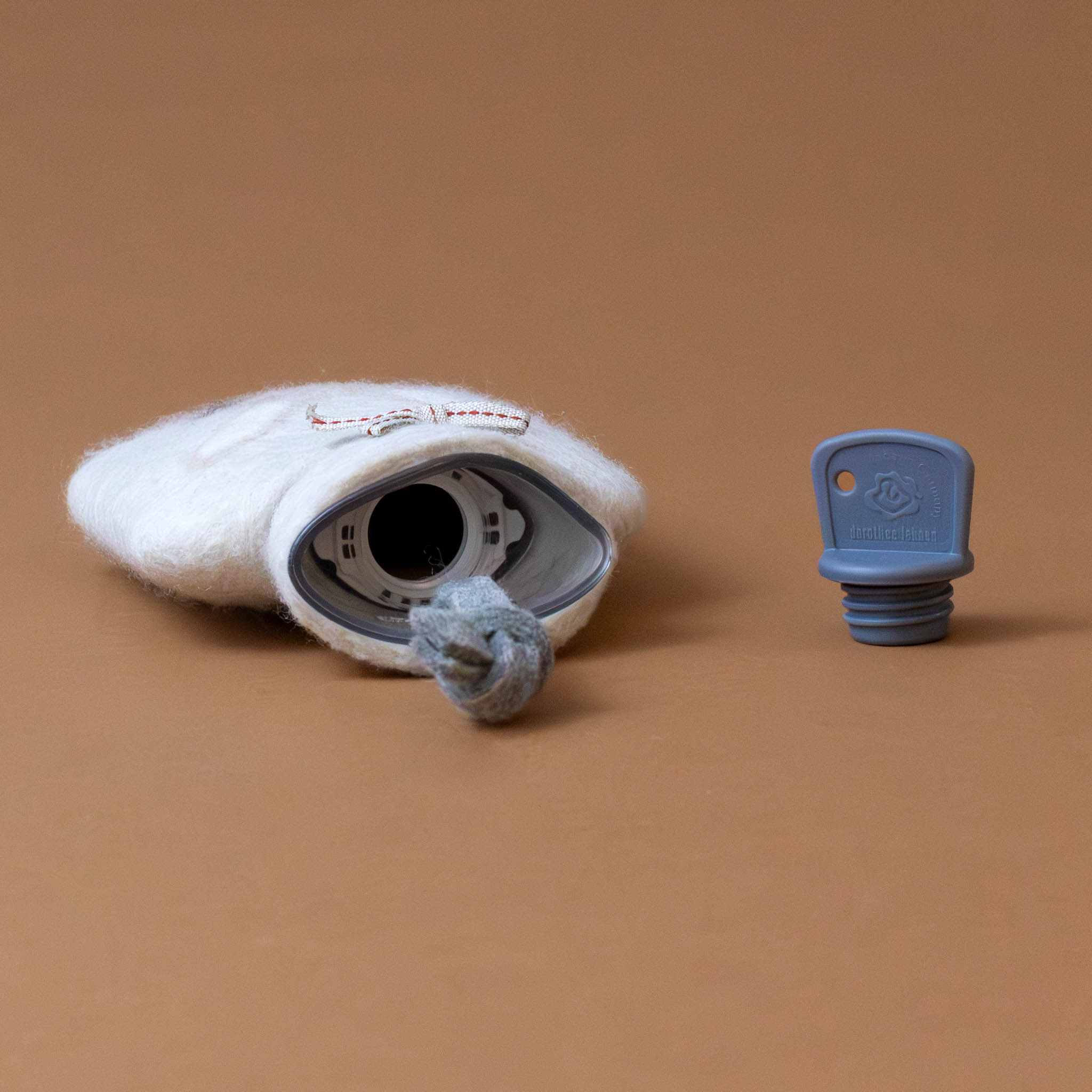 petite-felted-wool-hot-water-bottle-oatmeal-bunny-with-screw-top-off