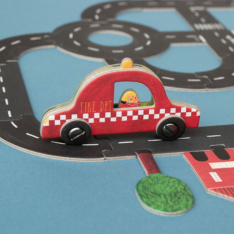 pocket-game-roads Red fire truck toy on a road track with a blue background