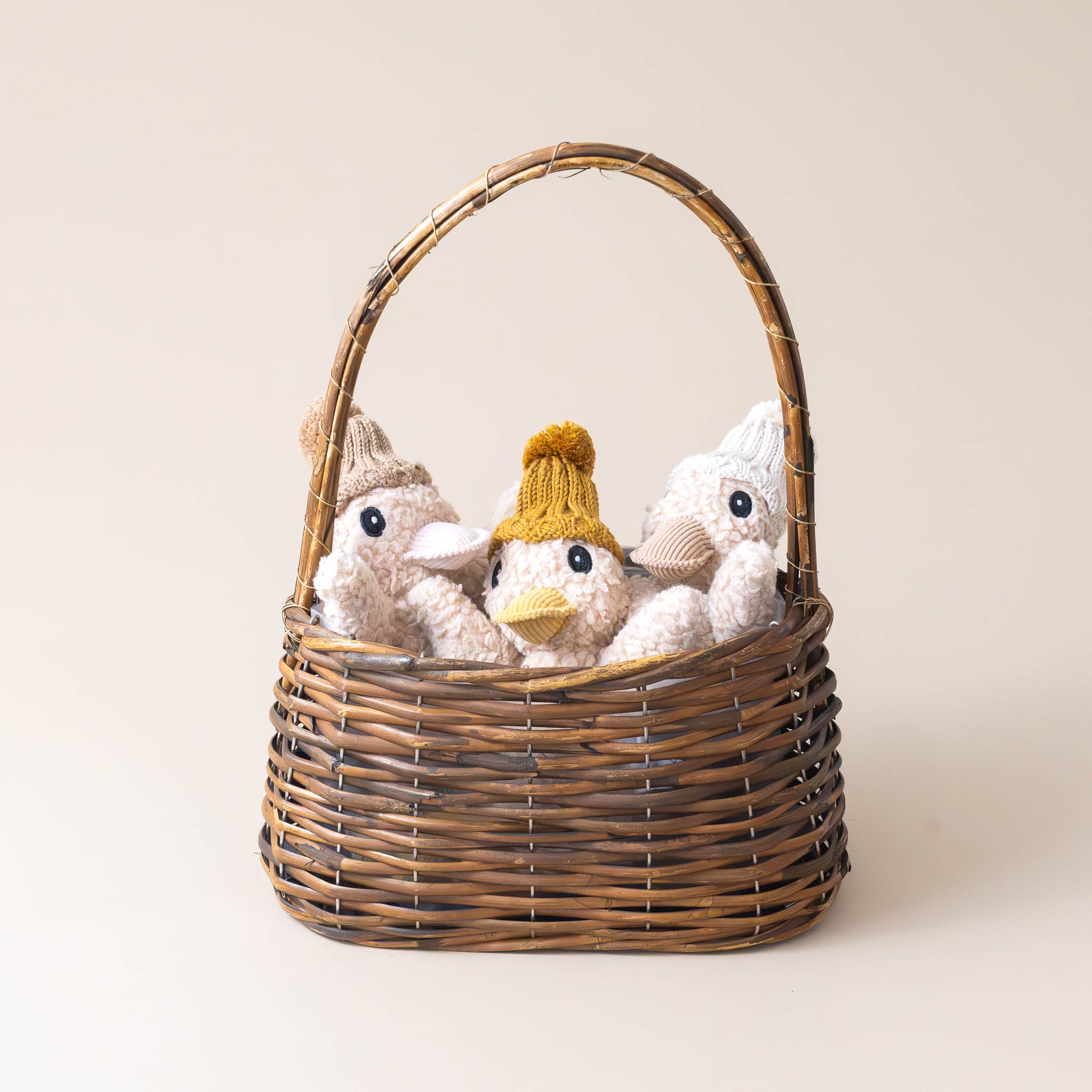 polished-woven-oval-basket-large-brown-with-3-stuffed-animals-inside