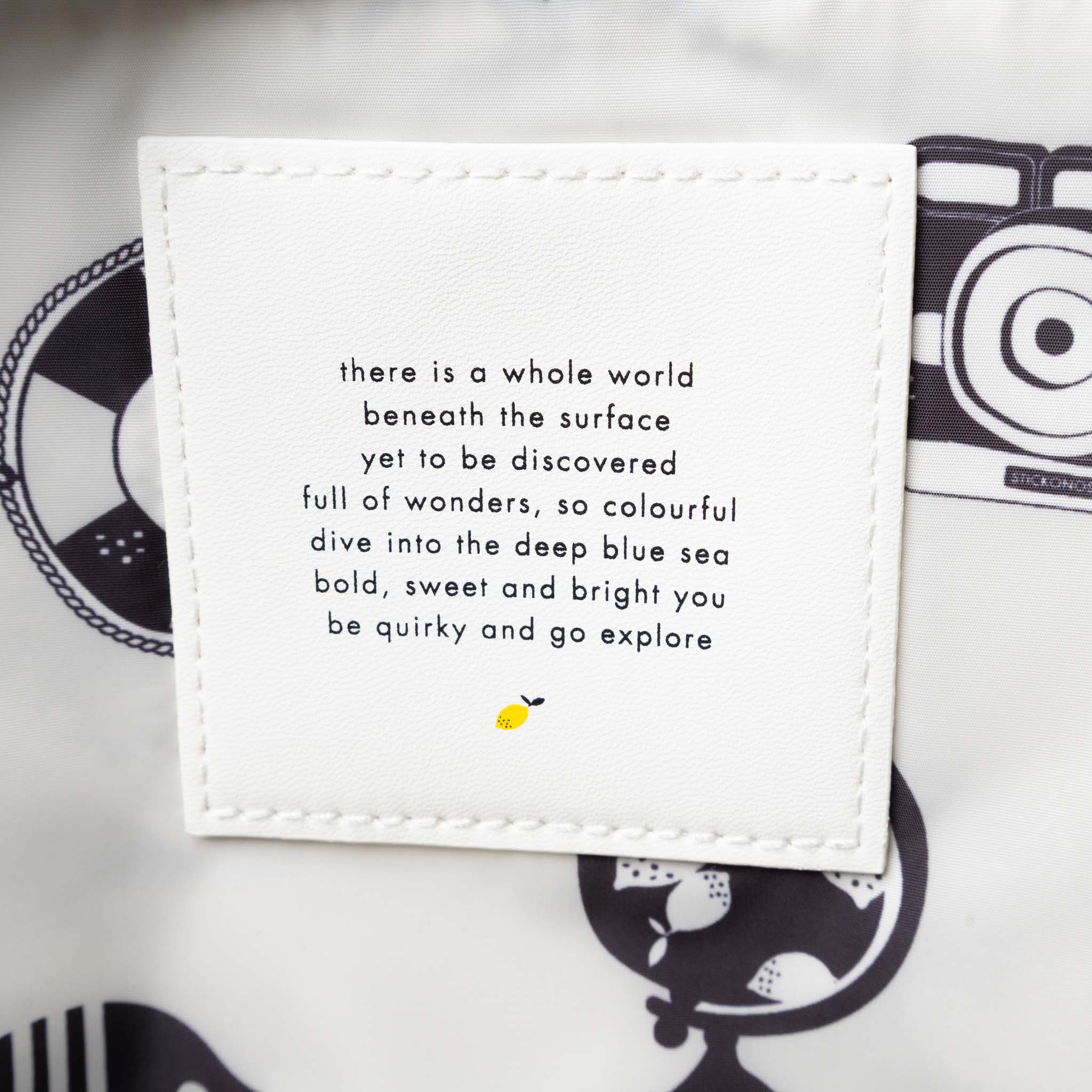 recycled-wonders-envelope-backpack-medium-lifebuoy-orange-with-a-blue-pocket-orange-striped-straps-interior-quote