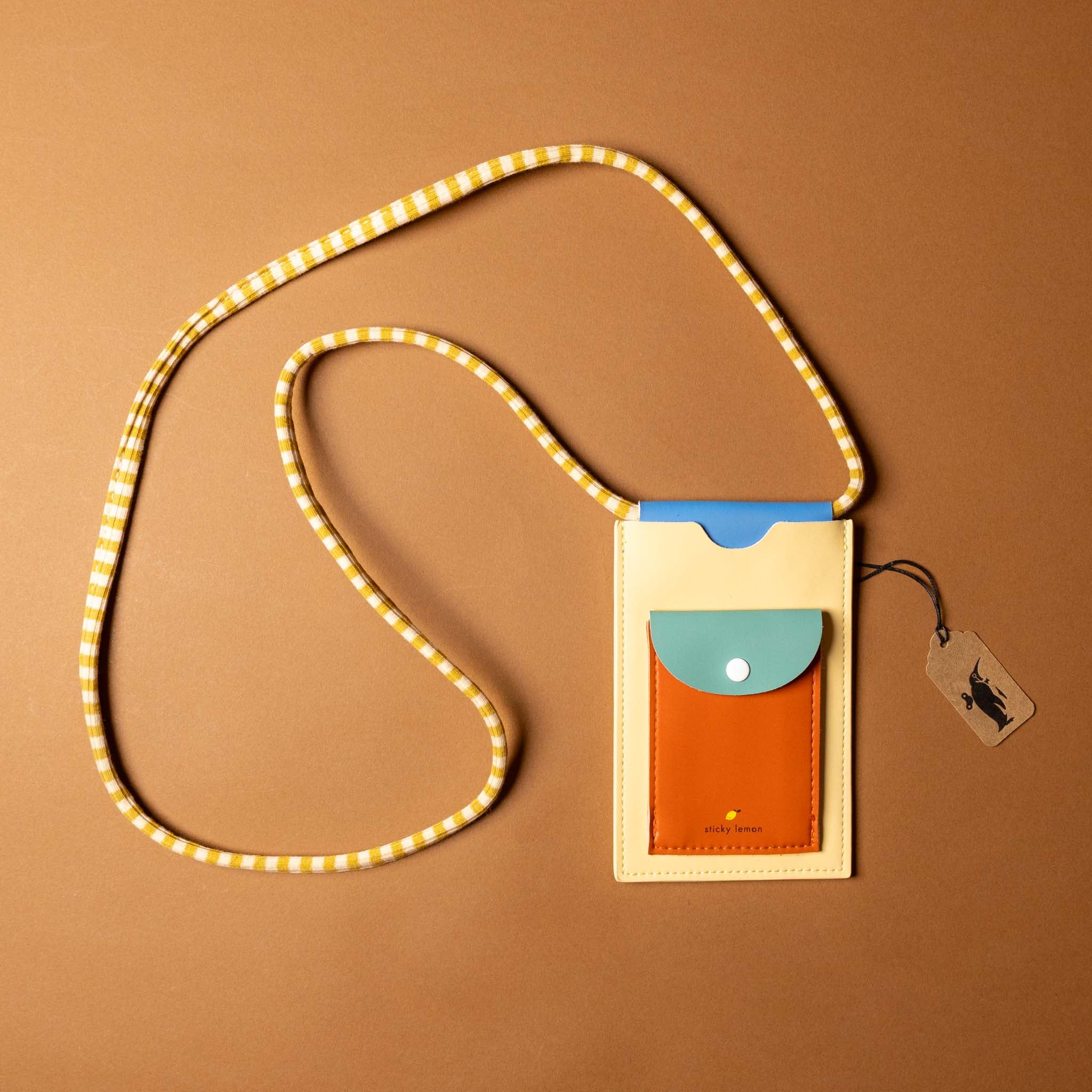 recycled-wonders-phone-pouch-sandy-beach-with-yellow-striped-strap